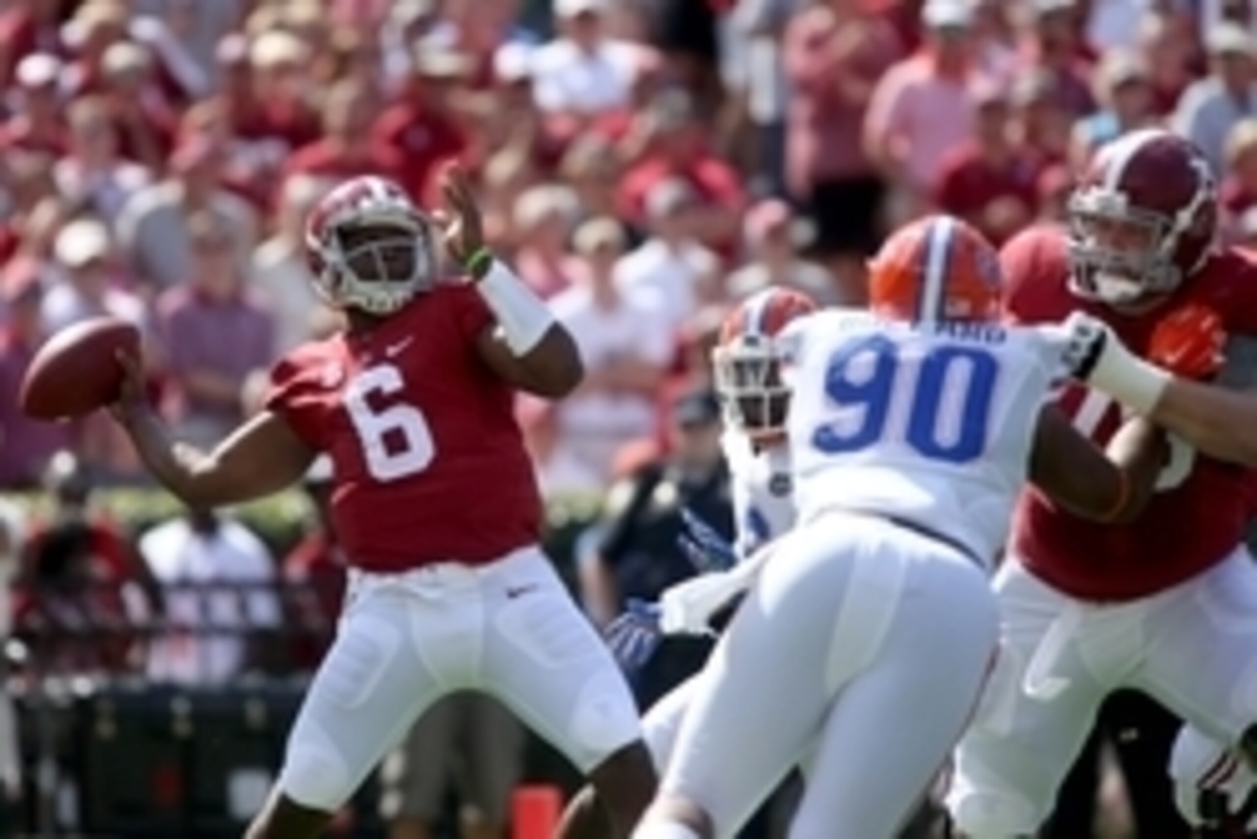 Sep 20, 2014; Tuscaloosa, AL, USA; Alabama Crimson Tide quarterback Blake Sims (6) throws a long touchdown pass in the first quarter of their game against the Florida Gators at Bryant-Denny Stadium. Mandatory Credit: Jason Getz-USA TODAY Sports