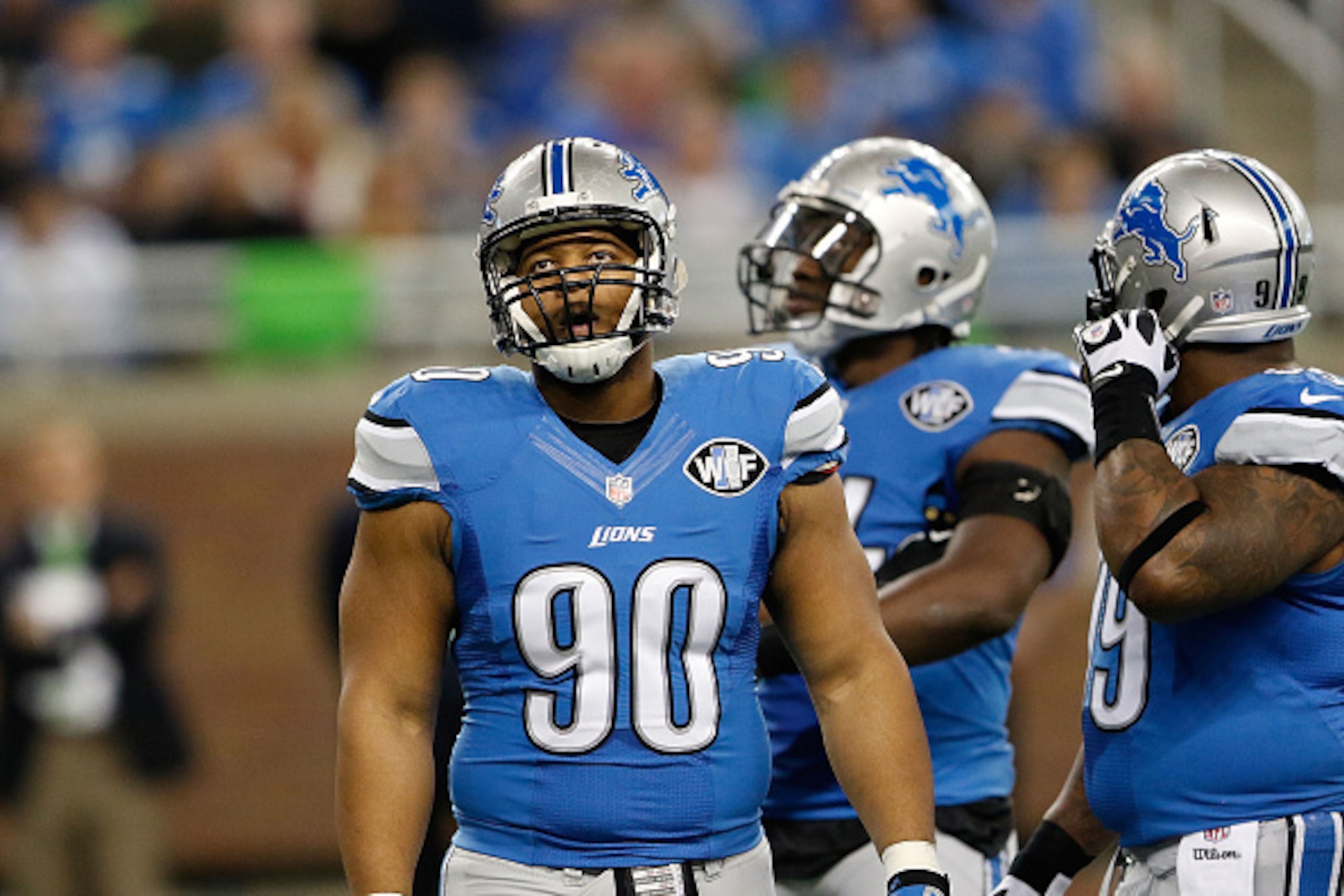 DETROIT, MI - DECEMBER 07:  Ndamukong Suh #90 of the Detroit Lions looks to the sidelines during the third quarter of the game against the Tampa Bay Buccaneers at Ford Field on December 7, 2014 in Detroit, Michigan. The Lions defeated the Buccaneers 34-17