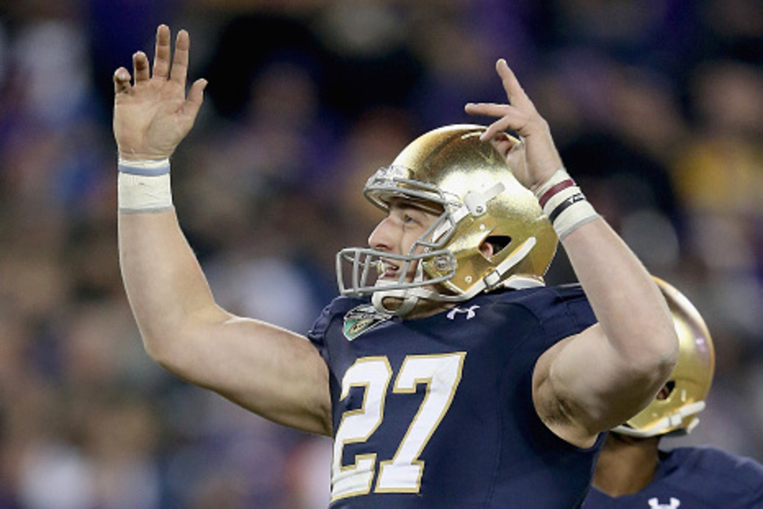 NASHVILLE, TN - DECEMBER 30: Kyle Brindza #27 of the Notre Dame Fighting Irish celebrates after kicking the game winning field goal against the LSU Tigers in the Franklin American Mortgage Music City Bowl at LP Field on December 30, 2014 in Nashville, Te NASHVILLE, TN - DECEMBER 30: Kyle Brindza #27 of the Notre Dame Fighting Irish celebrates after kicking the game winning field goal against the LSU Tigers in the Franklin American Mortgage Music City Bowl at LP Field on December 30, 2014 in Nashville, Te