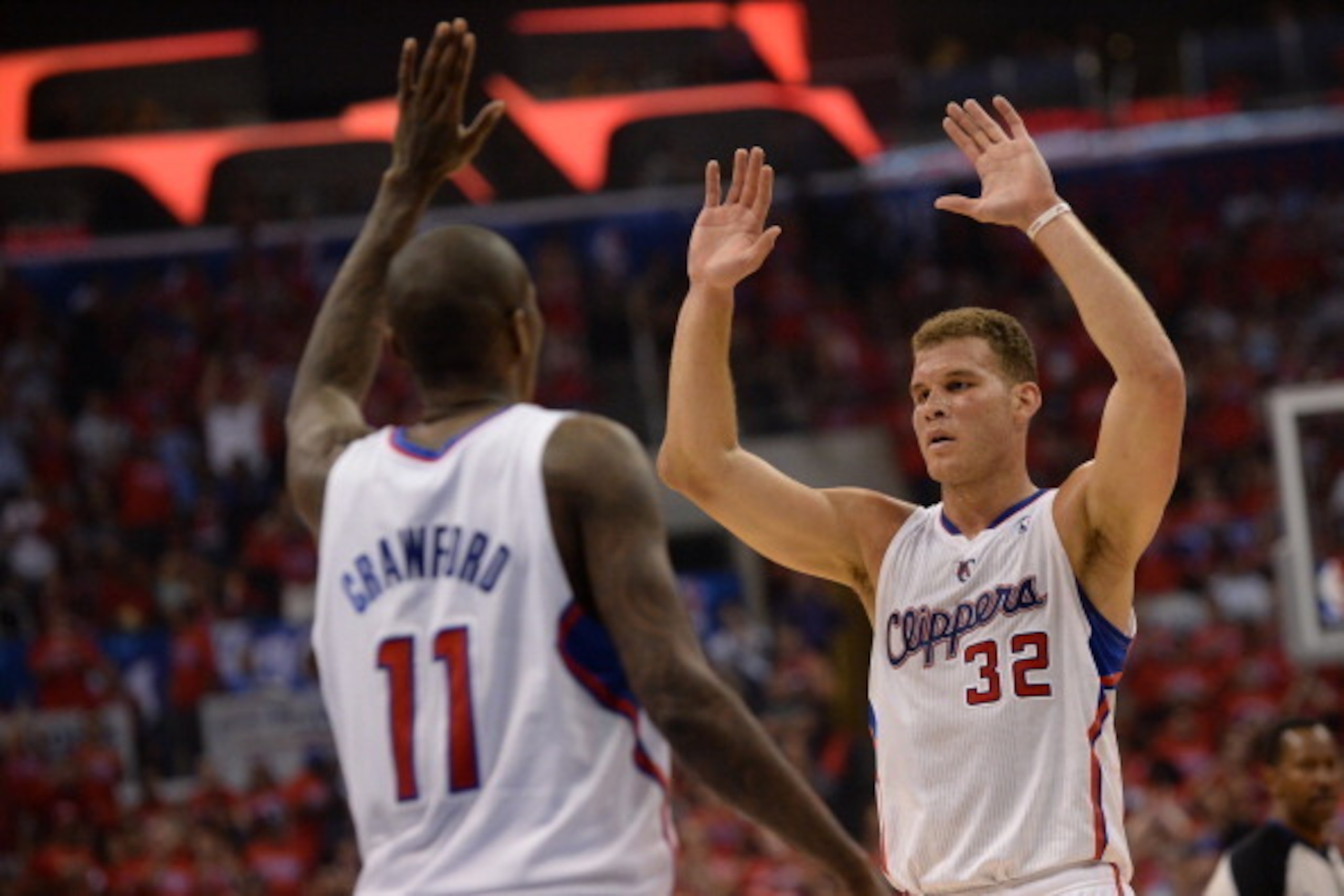 LOS ANGELES, CA - MAY 15: Jamal Crawford #11 and Blake Griffin #32 of the Los Angeles Clippers celebrate after the first quarter of Game Six of the Western Conference Semifinals against the Oklahoma City Thunder during the 2014 NBA Playoffs at Staples Cen