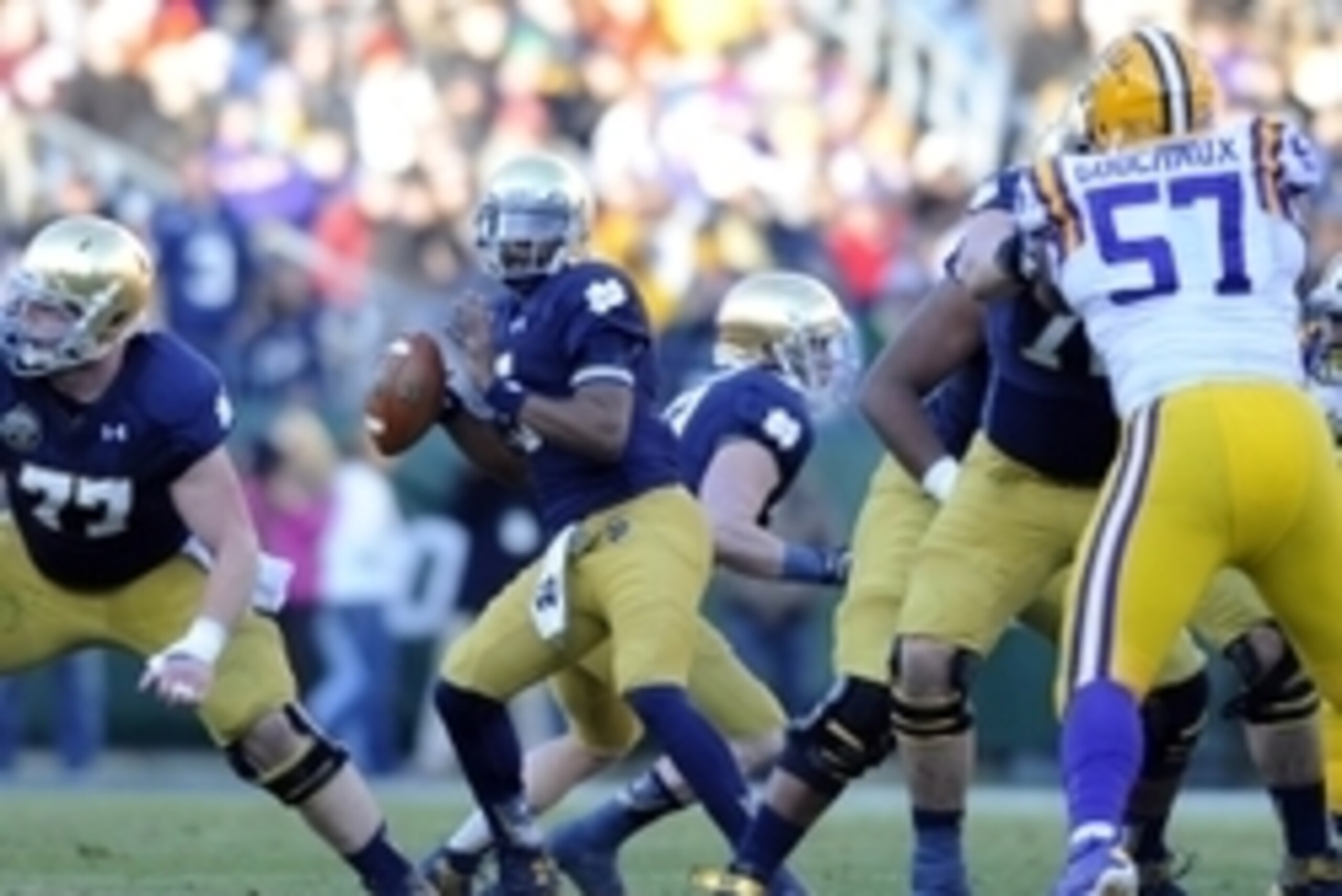 Dec 30, 2014; Nashville, TN, USA; Notre Dame Fighting Irish quarterback Everett Golson (5) drops back to pass during the first half against the LSU Tigers in the Music City Bowl at LP Field. Mandatory Credit: Christopher Hanewinckel-USA TODAY Sports