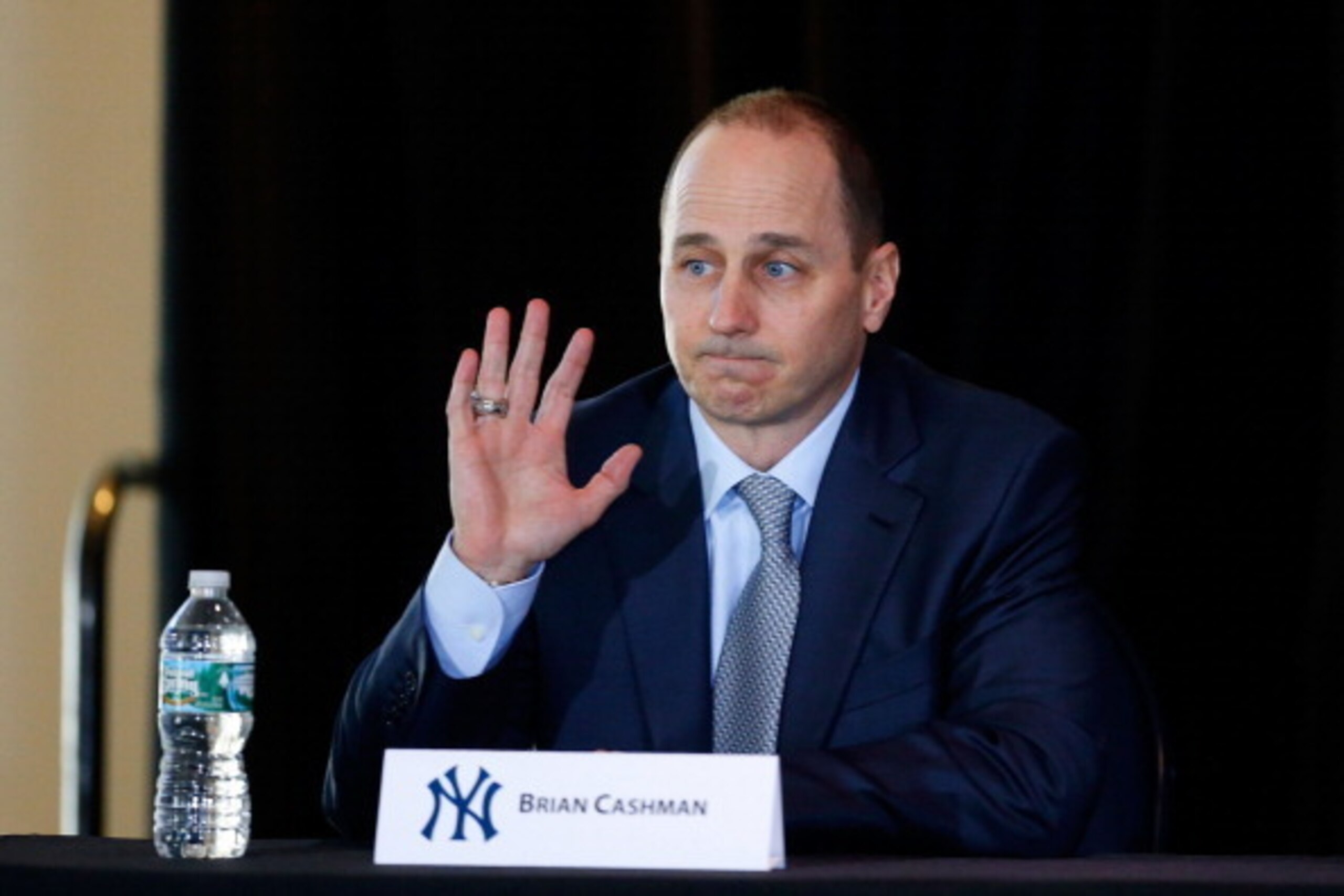 NEW YORK, NY - FEBRUARY 11:  General Manager Brian Cashman of the New York Yankees looks on during a news conference introducing Masahiro Tanaka (not pictured) to the media on February 11, 2014 at Yankee Stadium in the Bronx borough of New York City.  (Ph