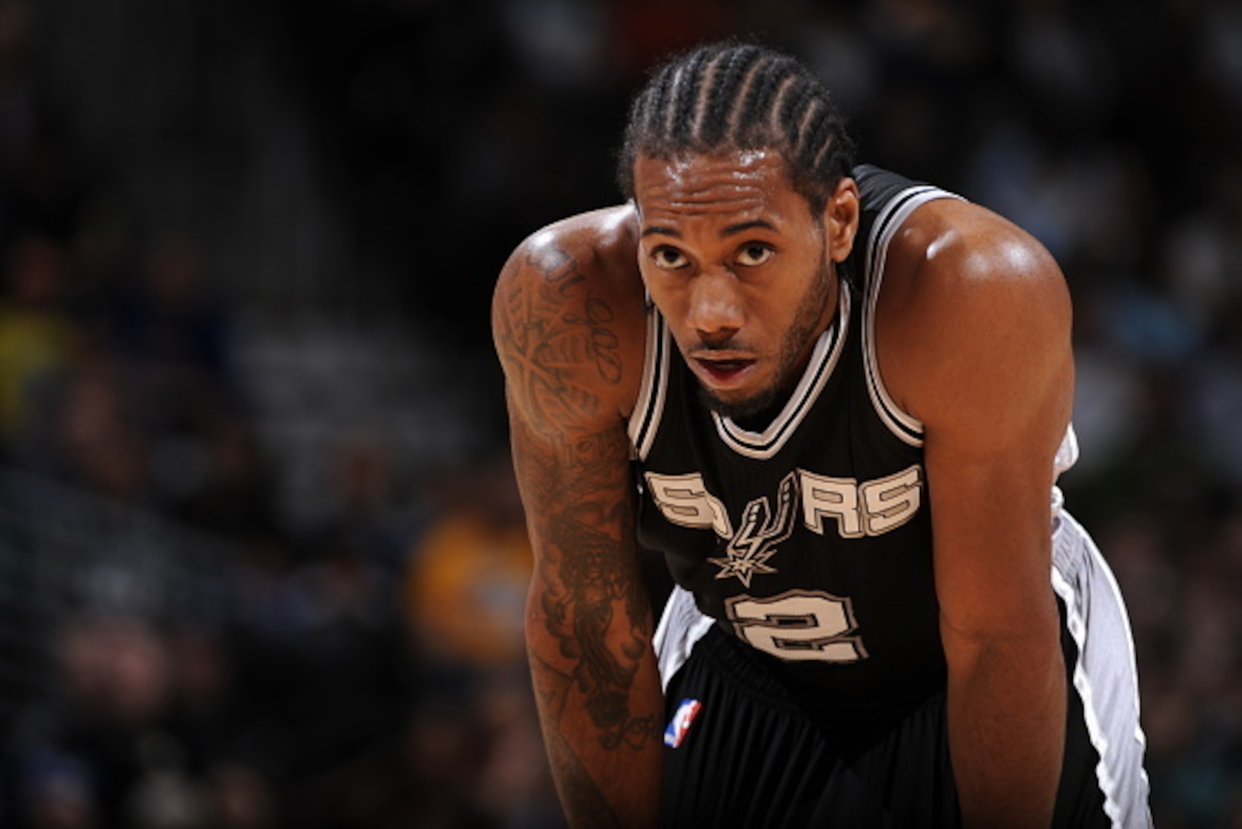 DENVER, CO - December 14: Kawhi Leonard #2 of the San Antonio Spurs during the game against the Denver Nuggets on December 14, 2014 at Pepsi Center in Denver, Colorado. NOTE TO USER: User expressly acknowledges and agrees that, by downloading and or using
