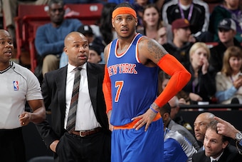 SACRAMENTO, CA - DECEMBER 27: Head Coach Derek Fisher of the New York Knicks coaches Carmelo Anthony #7 against the Sacramento Kings on December 27, 2014 at Sleep Train Arena in Sacramento, California. NOTE TO USER: User expressly acknowledges and agrees 