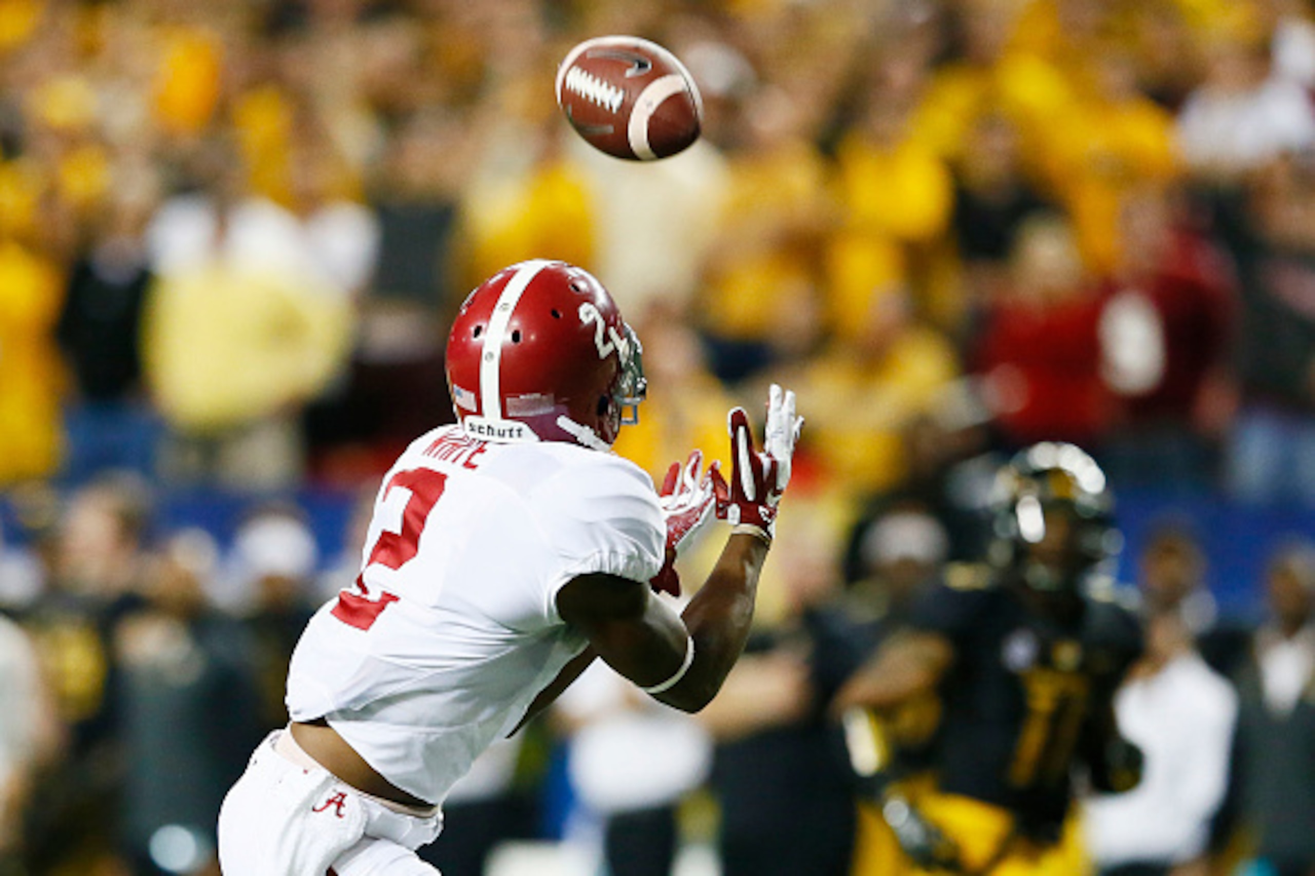 ATLANTA, GA - DECEMBER 06:  DeAndrew White #2 of the Alabama Crimson Tide completes a reception for a touchdown against the Missouri Tigers in the second quarter of the SEC Championship game at the Georgia Dome on December 6, 2014 in Atlanta, Georgia.  (P
