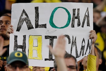 SANTA CLARA, CA - DECEMBER 5:  Fans hold up a Heisman sign for Marcus Mariota #8 of the Oregon Ducks during a game against the Arizona Wildcats on December 5, 2014 during the Pac-12 Championship at Levi's Stadium in Santa Clara, California.  Oregon won 51