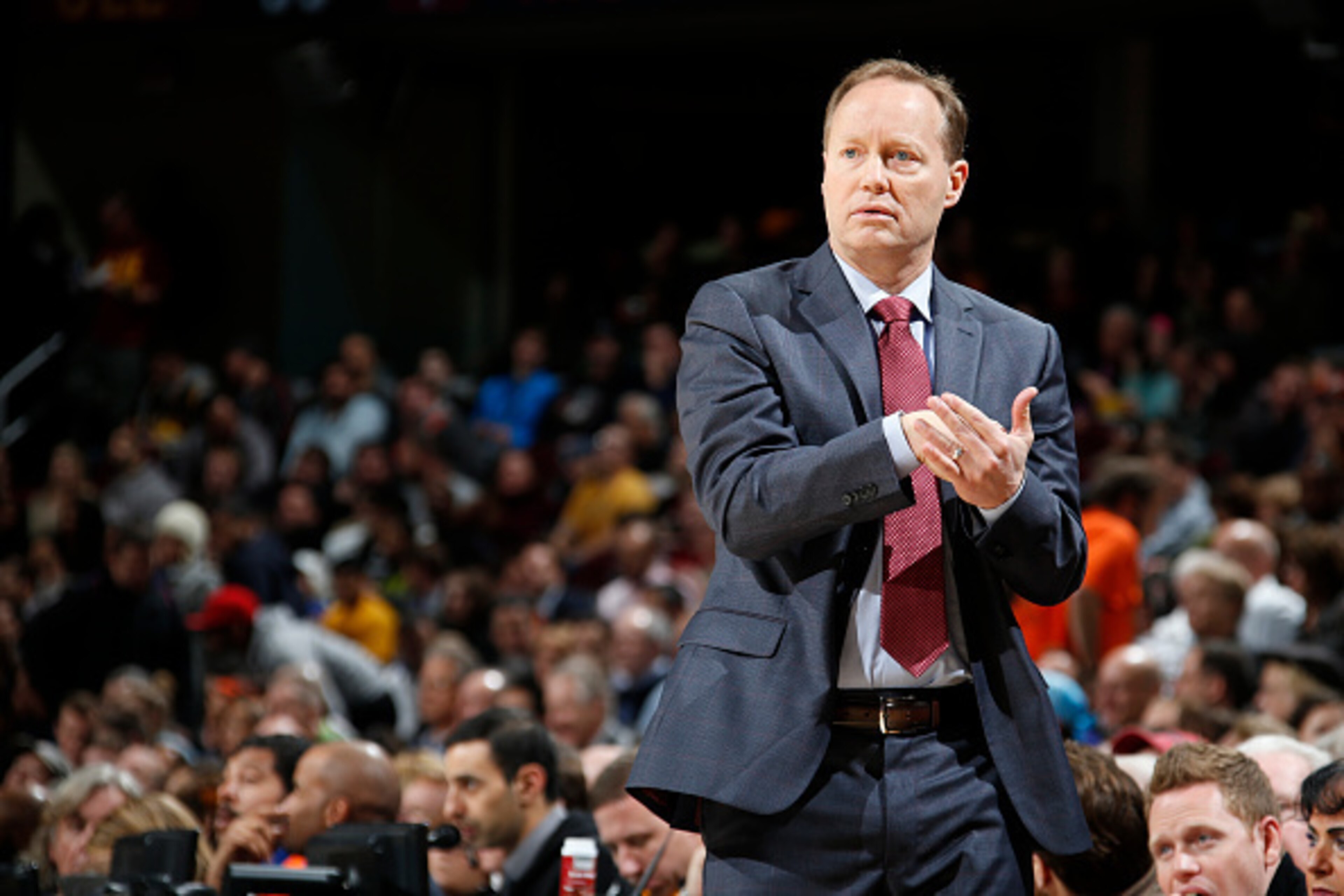 CLEVELAND, OH - DECEMBER 17: Mike Budenholzer Head Coach of the Atlanta Hawks calls a play during a game against the Cleveland Cavaliers at The Quicken Loans Arena on December 17, 2014 in Cleveland, Ohio. NOTE TO USER: User expressly acknowledges and agre CLEVELAND, OH - DECEMBER 17: Mike Budenholzer Head Coach of the Atlanta Hawks calls a play during a game against the Cleveland Cavaliers at The Quicken Loans Arena on December 17, 2014 in Cleveland, Ohio. NOTE TO USER: User expressly acknowledges and agre