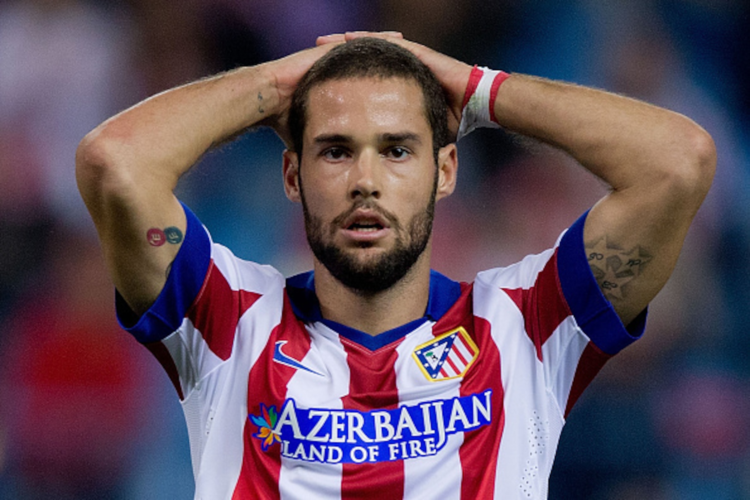 MADRID, SPAIN - OCTOBER 22: Mario Suarez of Atletico de Madrid reacts as he fail to score during the UEFA Champions League group A match between Club Atletico de Madrid and Malmo FF at Vicente Calderon stadium on October 22, 2014 in Madrid, Spain.  (Photo