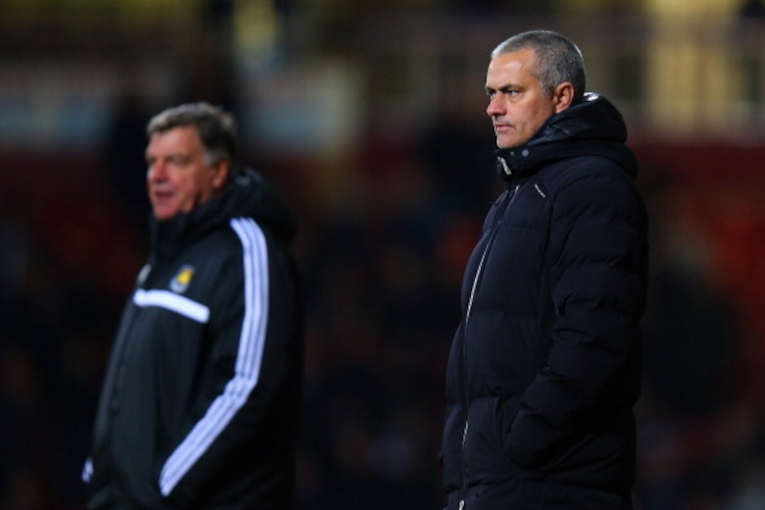 LONDON, ENGLAND - NOVEMBER 23:  Manager Sam Allardyce of West Ham and Jose Mourinho manager of Chelsea look on from touchline during the Barclays Premier League match between West Ham United and Chelsea at Boleyn Ground on November 23, 2013 in London, Eng