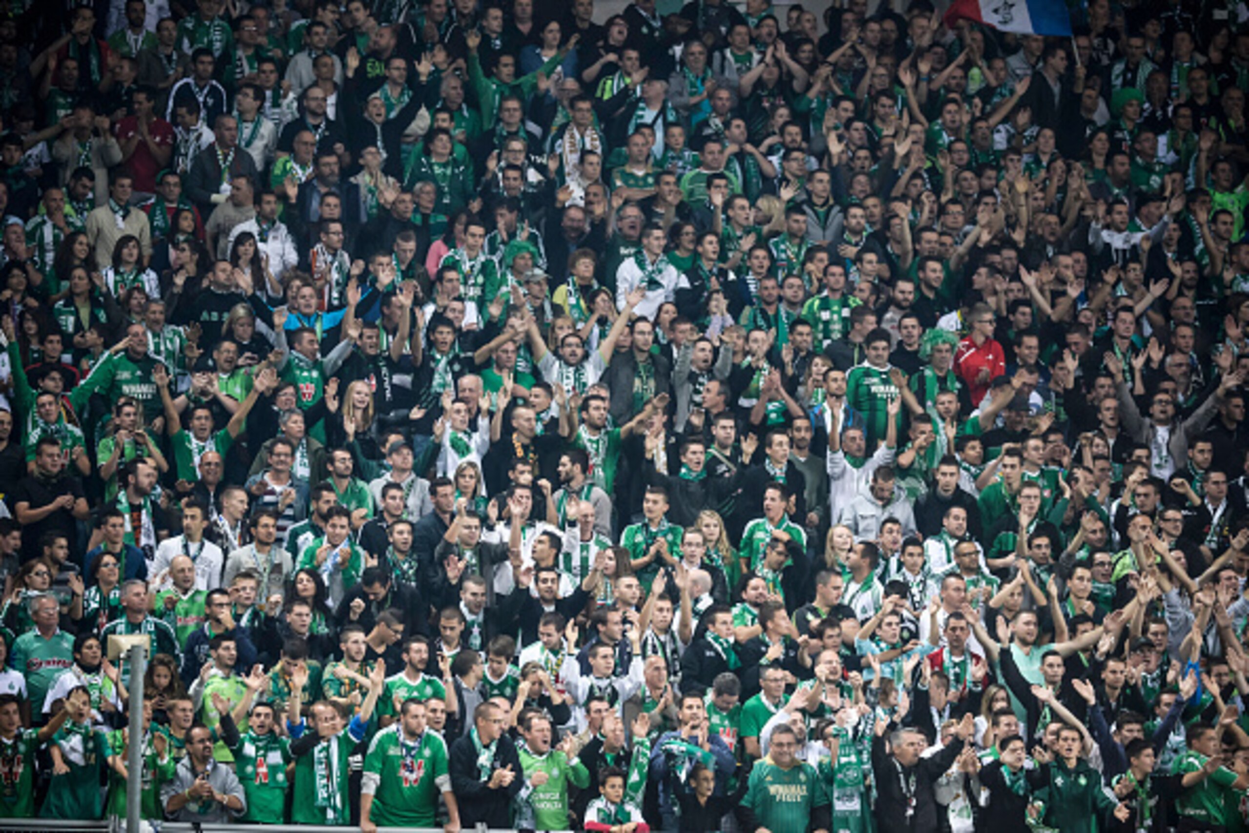 SAINT ETIENNE,FRANCE - OCTOBER 2: St Etienne's supporters during the UEFA Europa League football match AS Saint-Etienne against FC Dnipro Dnipropetrovsk at the Geoffroy Guichard Stadium on October 2, 2014 in Saint-Etienne, France. (Photo by Jean Phillipp SAINT ETIENNE,FRANCE - OCTOBER 2: St Etienne's supporters during the UEFA Europa League football match AS Saint-Etienne against FC Dnipro Dnipropetrovsk at the Geoffroy Guichard Stadium on October 2, 2014 in Saint-Etienne, France. (Photo by Jean Phillipp