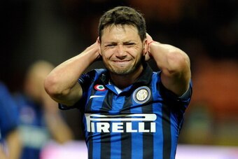 MILAN, ITALY - APRIL 11:  Mauro Zarate of FC Inter Milan looks dejected during the Serie A match between FC Internazionale Milano and AC Siena at Stadio Giuseppe Meazza on April 11, 2012 in Milan, Italy.  (Photo by Claudio Villa/Getty Images)