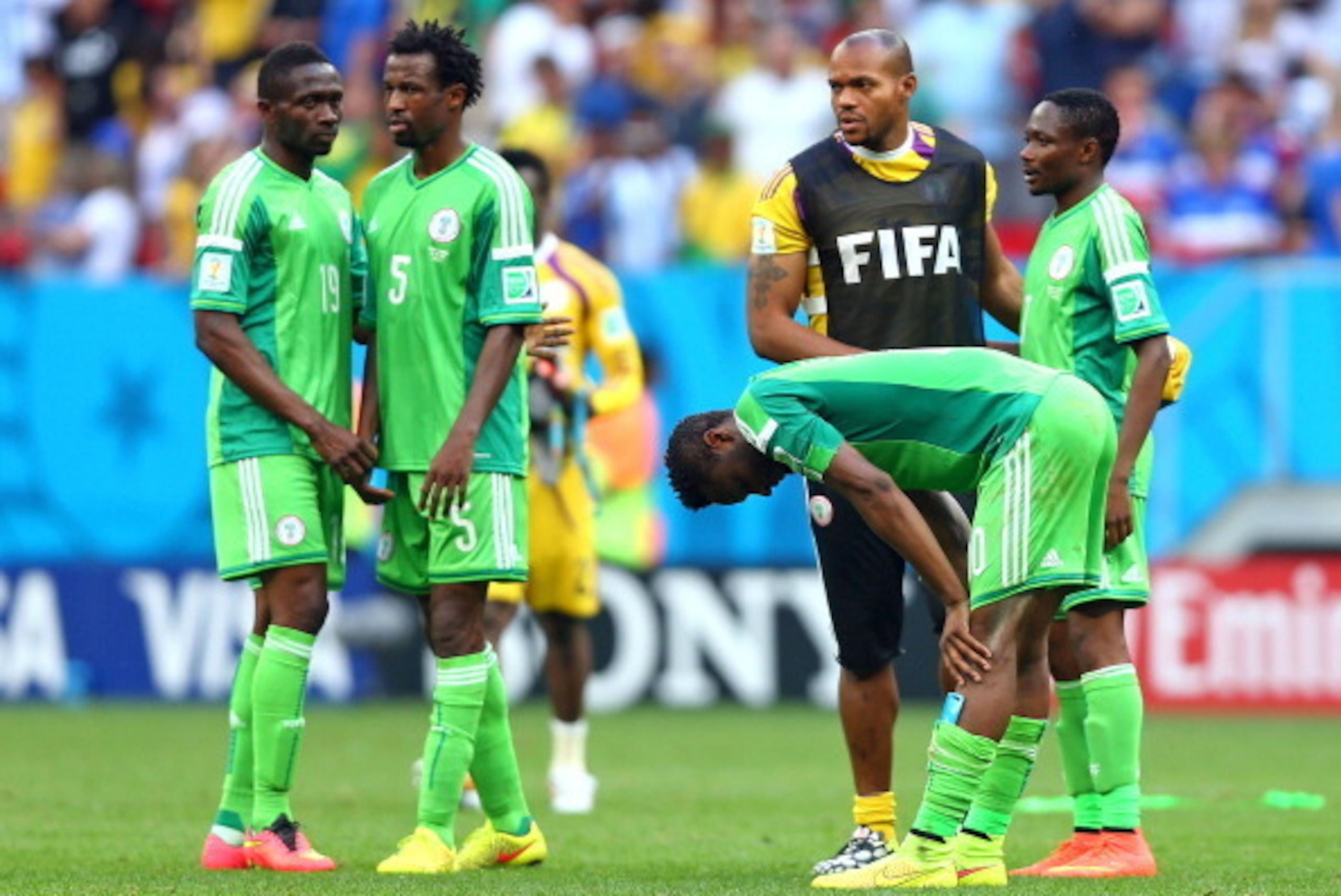 BRASILIA, BRAZIL - JUNE 30: John Obi Mikel of Nigeria reacts with teammates after being defeated by France 2-0 during the 2014 FIFA World Cup Brazil Round of 16 match between France and Nigeria at Estadio Nacional on June 30, 2014 in Brasilia, Brazil.  (P