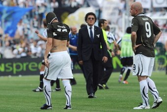 UDINE, ITALY - MAY 08:  Mauro Zarate of Lazio (L) shows his dejection after the Serie A match between Udinese Calcio and SS Lazio at Stadio Friuli on May 8, 2011 in Udine, Italy.  (Photo by Dino Panato/Getty Images)