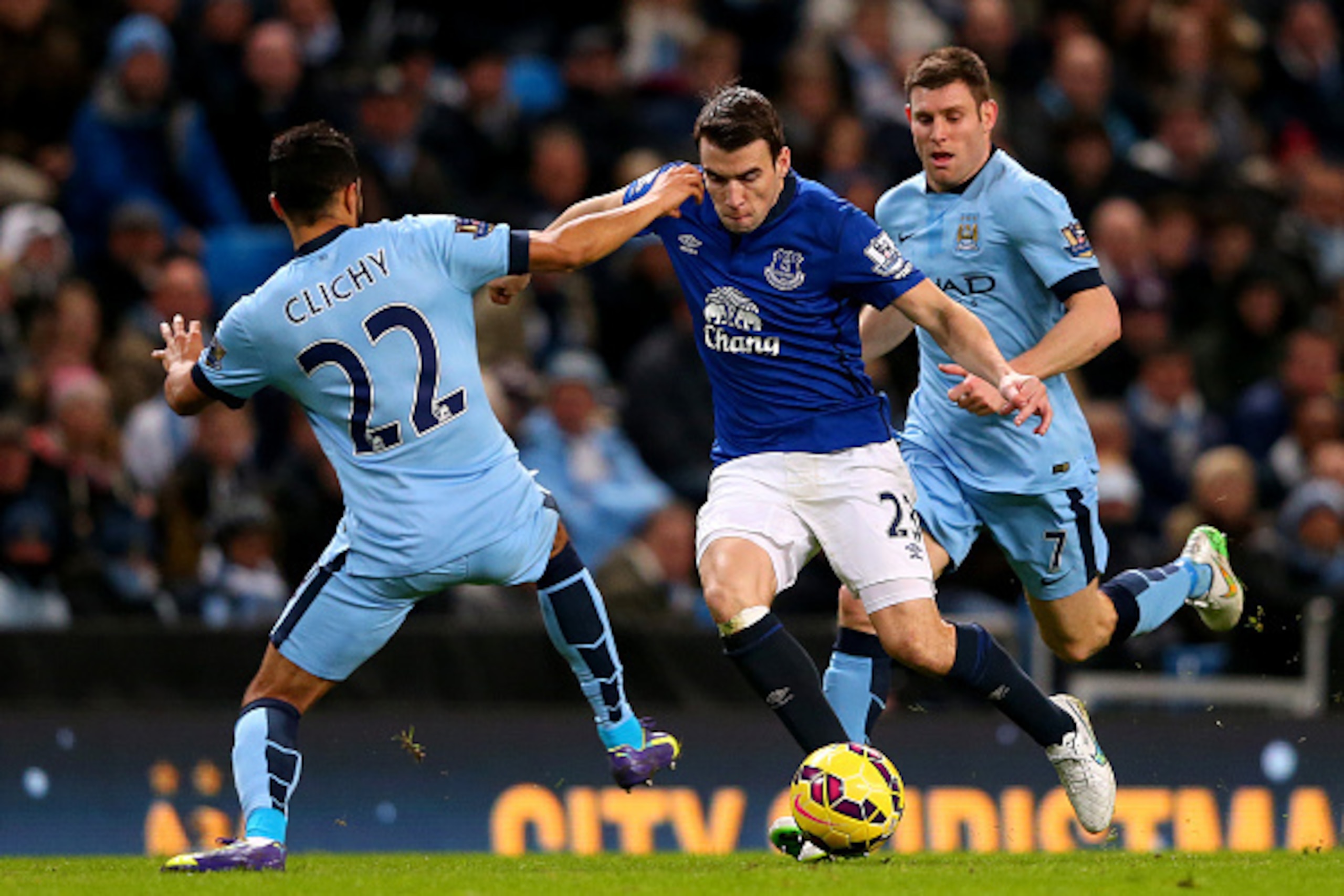 MANCHESTER, ENGLAND - DECEMBER 06:  Seamus Coleman of Everton battles for the ball with Gael Clichy of Manchester City during the Barclays Premier League match between Manchester City and Everton at Etihad Stadium on December 6, 2014 in Manchester, Englan