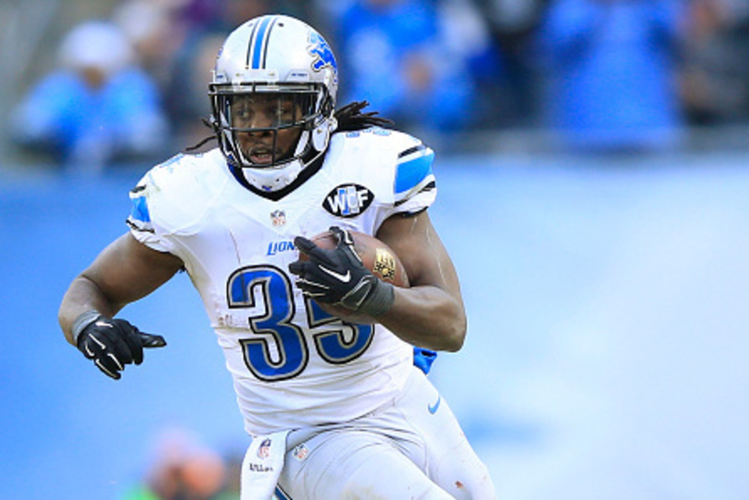 CHICAGO, IL - DECEMBER 21: Joique Bell #35 of the Detroit Lions runs the ball during the fourth quarter of a game against the Chicago Bears at Soldier Field on December 21, 2014 in Chicago, Illinois. The Lions defeated the Bears 20-14. (Photo by Jamie Squ