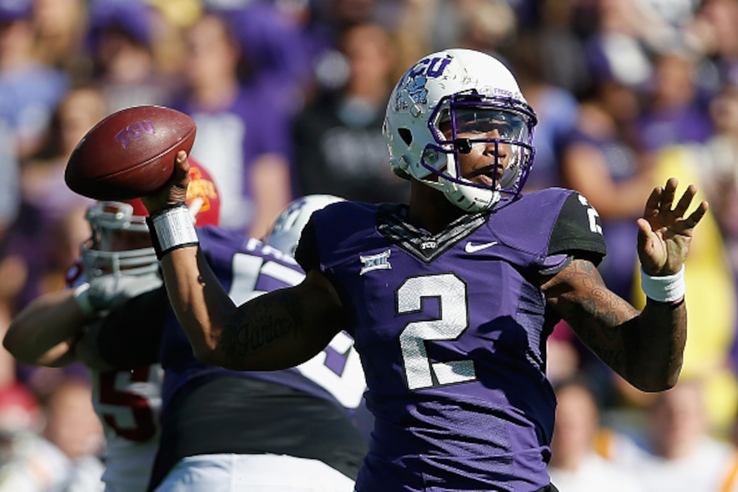 FORT WORTH, TX - DECEMBER 06:  Quarterback Trevone Boykin #2 of the TCU Horned Frogs throws a pass during the thrid quarter of the Big 12 college football game against the Iowa State Cyclones at Amon G. Carter Stadium on December 6, 2014 in Fort Worth, Te