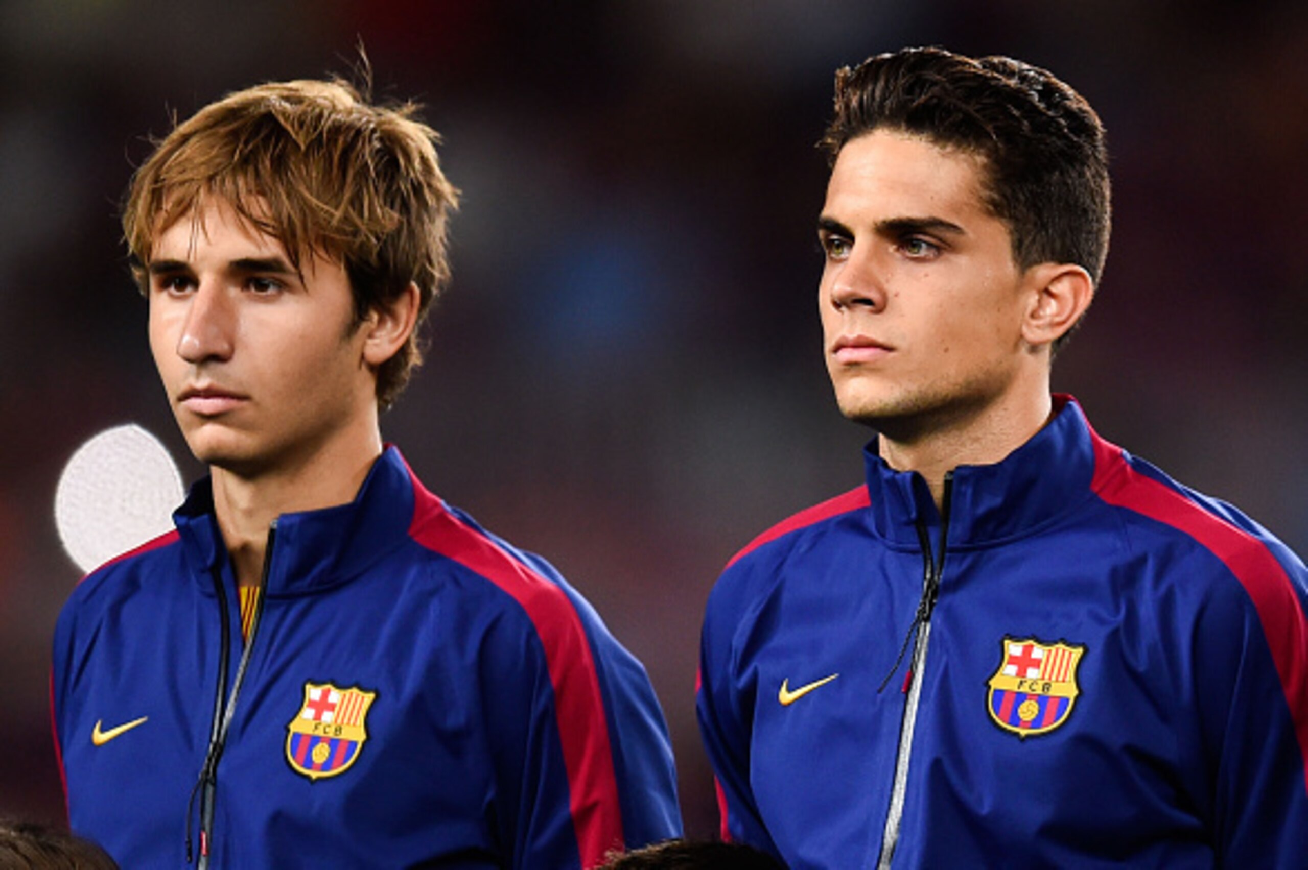 BARCELONA, SPAIN - SEPTEMBER 17: Sergi Samper (L) and Marc Bartra of FC Barcelona look on prior to the UEFA Champions League Group F match between FC Barcelona and APOEL FC at the Camp Nou Stadium on September 17, 2014 in Barcelona, Spain.  (Photo by Davi