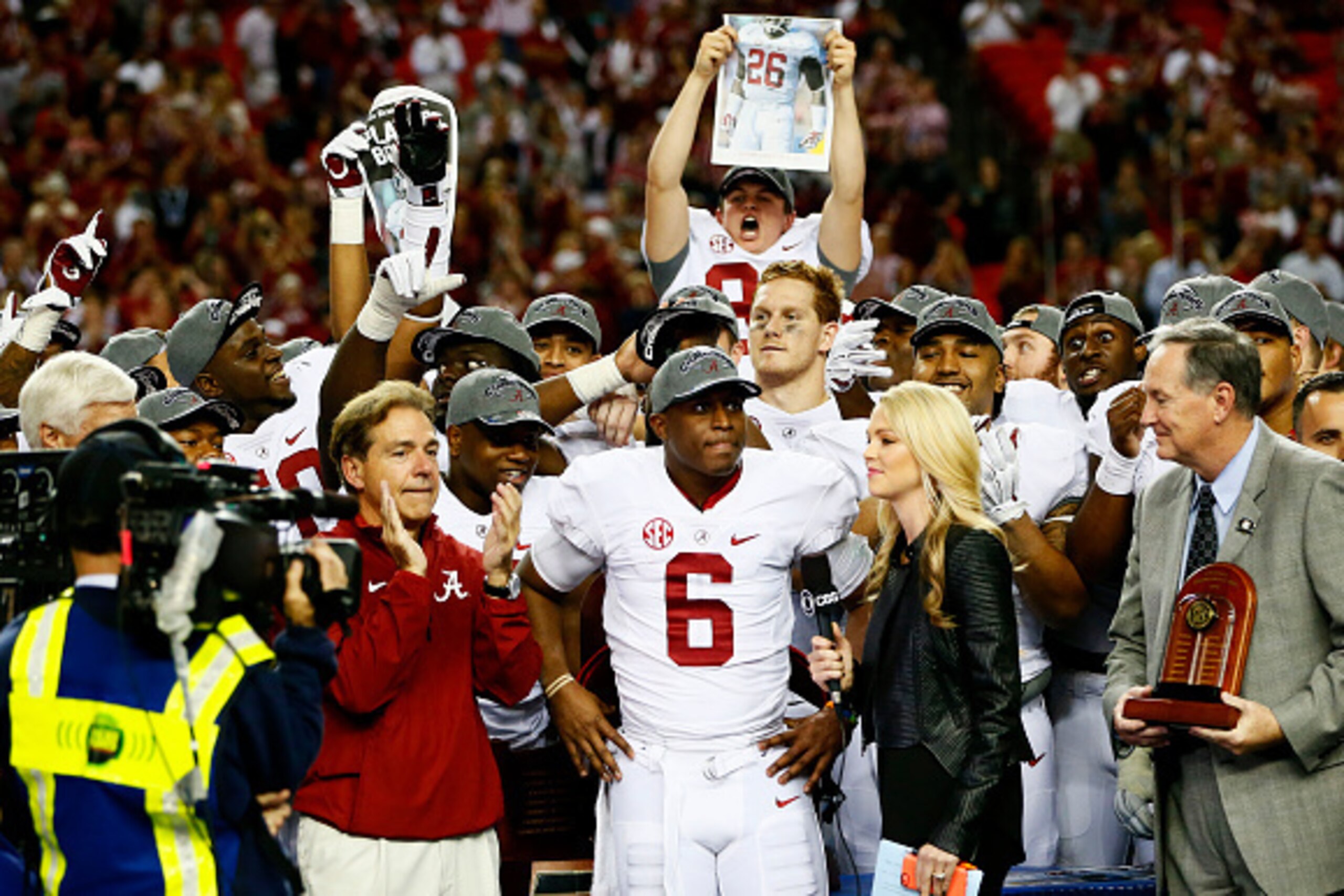 ATLANTA, GA - DECEMBER 06:  Head coach Nick Saban, Blake Sims #6 and the Alabama Crimson Tide celebrate their 42 to 13 win over the Missouri Tigers in the SEC Championship game at the Georgia Dome on December 6, 2014 in Atlanta, Georgia.  (Photo by Kevin 