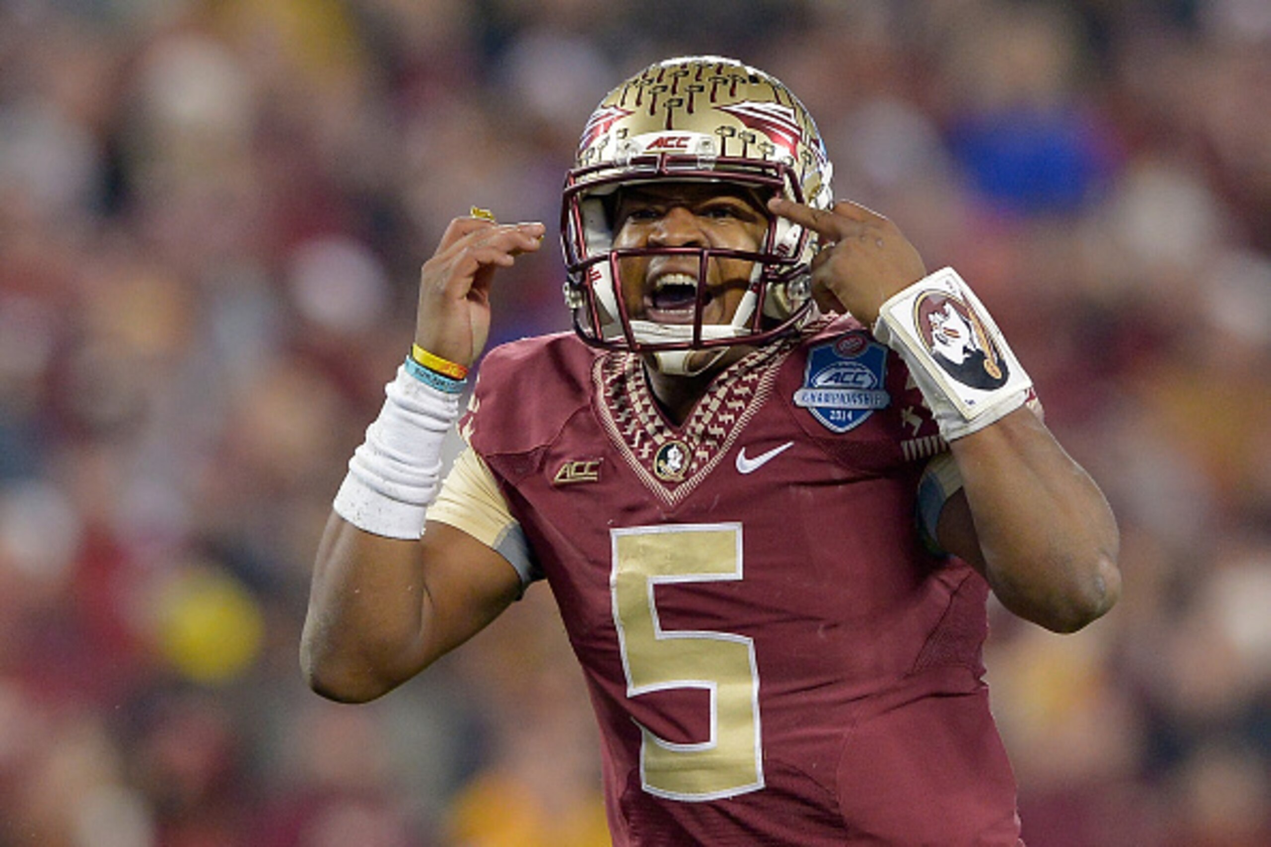 CHARLOTTE, NC - DECEMBER 06:  Jameis Winston #5 of the Florida State Seminoles calls an audible against the Georgia Tech Yellow Jackets during the Atlantic Coast Conference championship game on December 6, 2014 in Greenville, North Carolina. Florida State