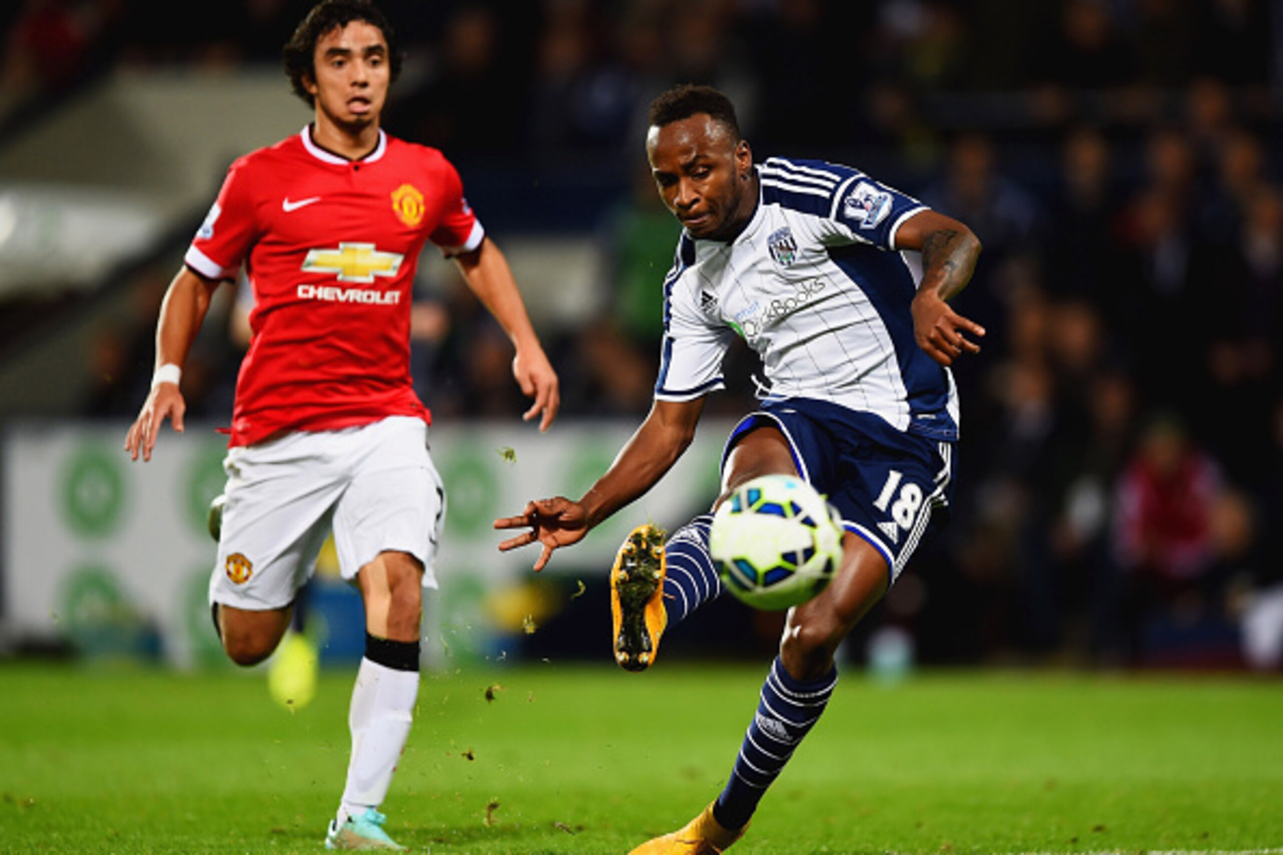 WEST BROMWICH, ENGLAND - OCTOBER 20: Saido Berahino of West Bromwich Albion scores their second goal as Rafael of Manchester United looks on during the Barclays Premier League match between West Bromwich Albion and Manchester United at The Hawthorns on O WEST BROMWICH, ENGLAND - OCTOBER 20: Saido Berahino of West Bromwich Albion scores their second goal as Rafael of Manchester United looks on during the Barclays Premier League match between West Bromwich Albion and Manchester United at The Hawthorns on O