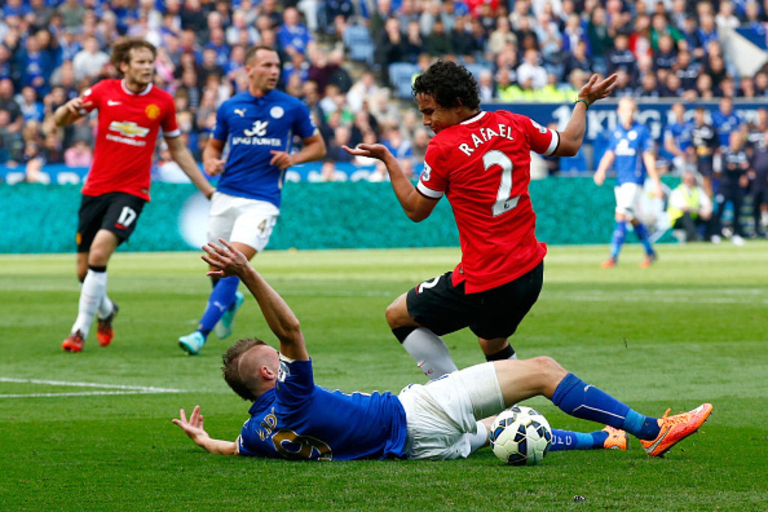 LEICESTER, ENGLAND - SEPTEMBER 21: Rafael of Manchester United reacts after bringing down Jamie Varley of Leicester City in the penalty area during the Barclays Premier League match between Leicester City and Manchester United at The King Power Stadium o LEICESTER, ENGLAND - SEPTEMBER 21: Rafael of Manchester United reacts after bringing down Jamie Varley of Leicester City in the penalty area during the Barclays Premier League match between Leicester City and Manchester United at The King Power Stadium o