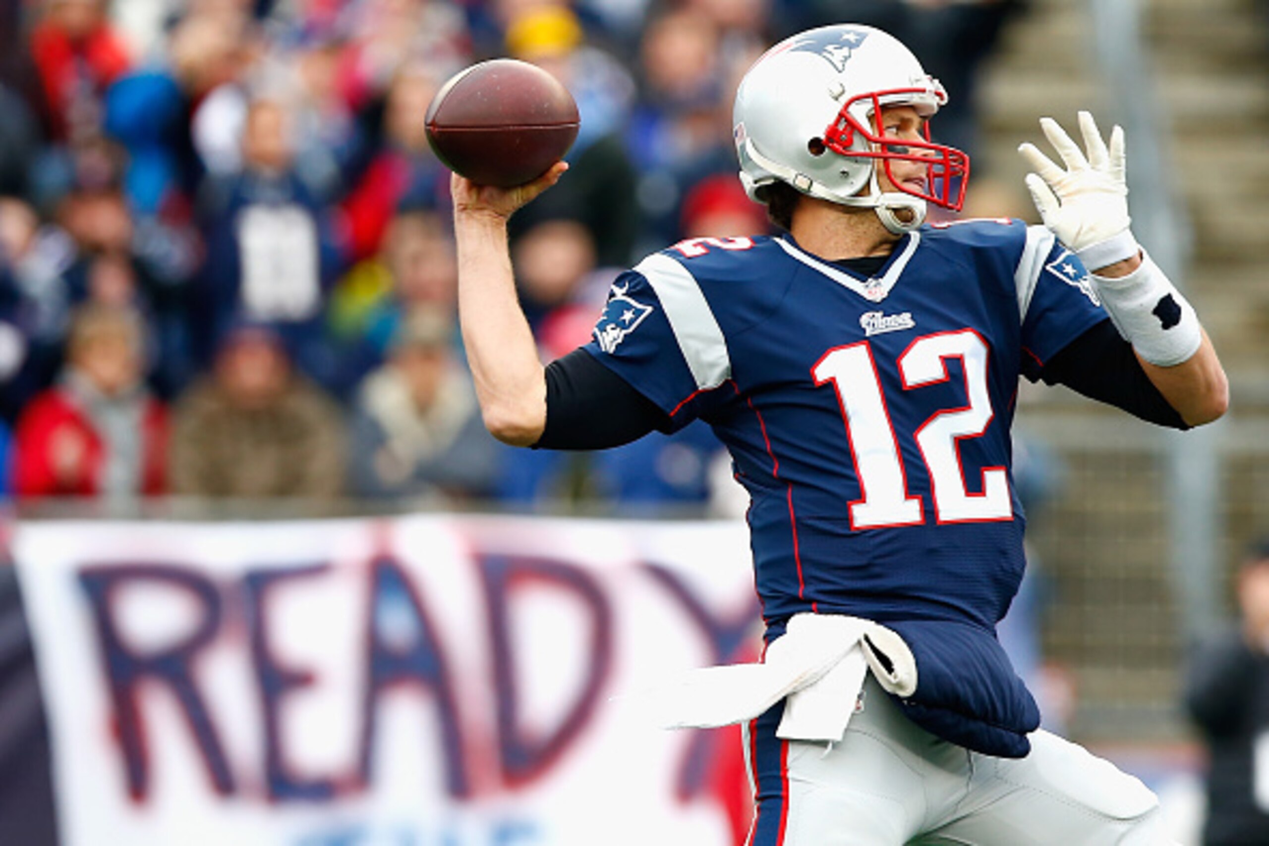 FOXBORO, MA - DECEMBER 28:  Tom Brady #12 of the New England Patriots passes the ball during the first quarter against the Buffalo Bills at Gillette Stadium on December 28, 2014 in Foxboro, Massachusetts.  (Photo by Jared Wickerham/Getty Images)
