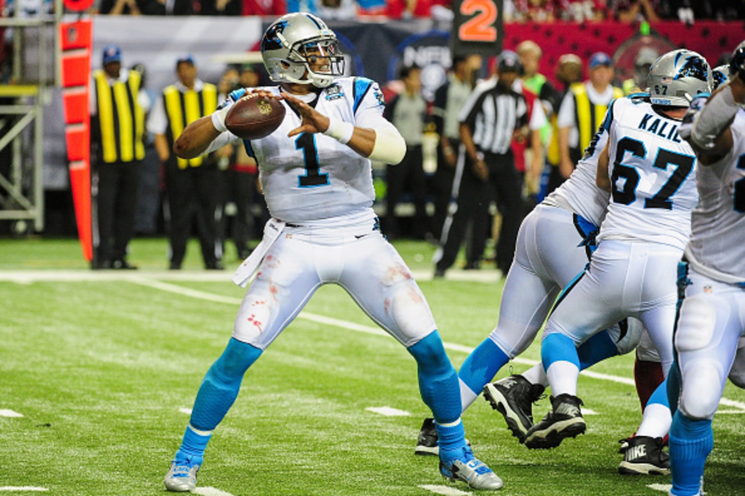 ATLANTA, GA - DECEMBER 28: Cam Newton #1 of the Carolina Panthers throws a pass in the first half against the Atlanta Falcons at the Georgia Dome on December 28, 2014 in Atlanta, Georgia.  (Photo by Scott Cunningham/Getty Images)