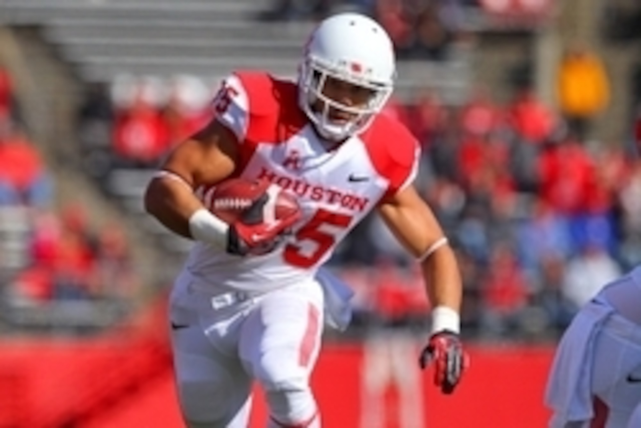 Oct 26, 2013; Piscataway, NJ, USA; Houston Cougars running back Kenneth Farrow (35) runs with the ball during the first half at High Point Solutions Stadium. Mandatory Credit: Ed Mulholland-USA TODAY Sports