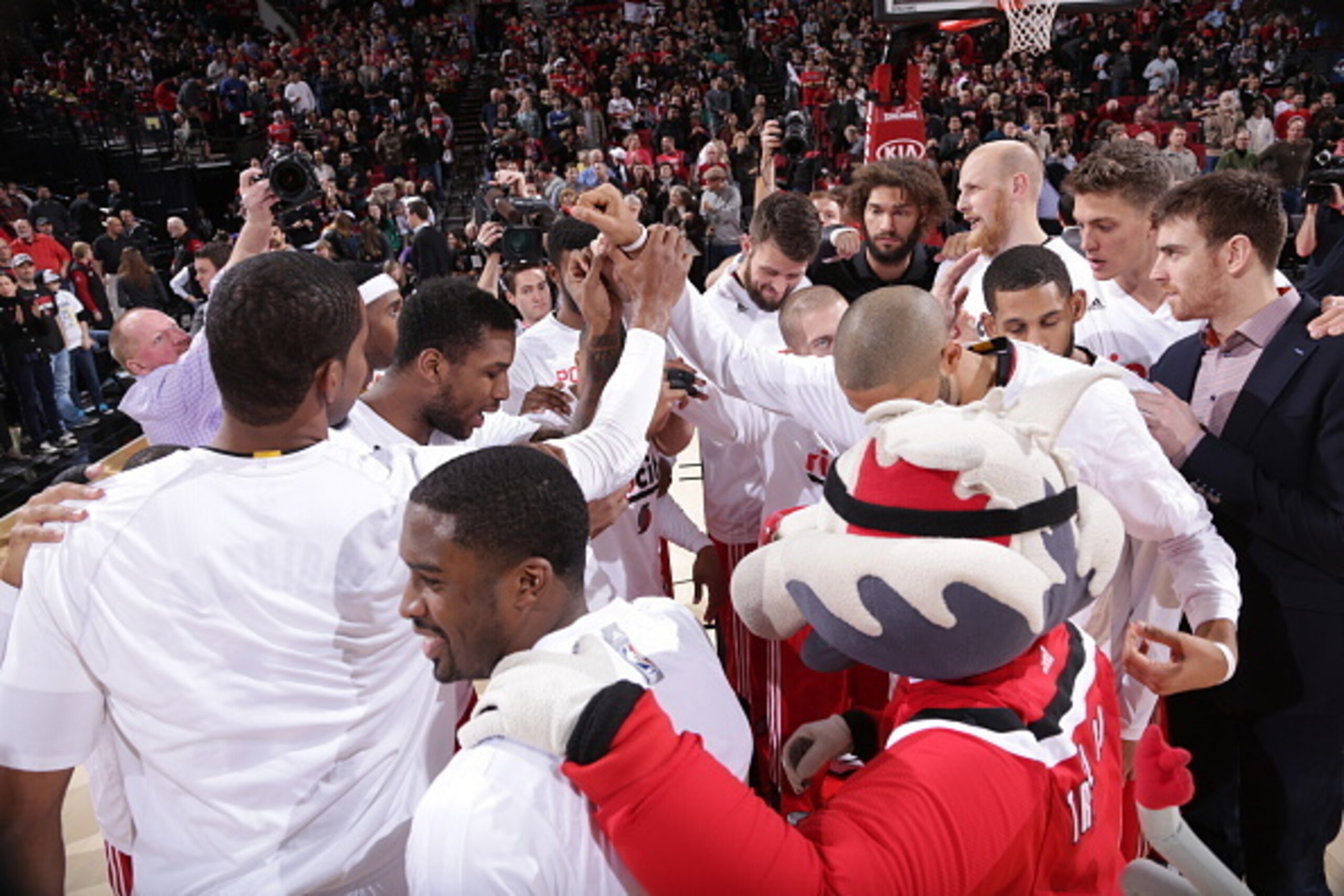 PORTLAND, OR - DECEMBER 17:  The Portland Trail Blazers huddle up before the game against the Milwaukee Bucks on December 17, 2014 at the Moda Center Arena in Portland, Oregon. NOTE TO USER: User expressly acknowledges and agrees that, by downloading and 
