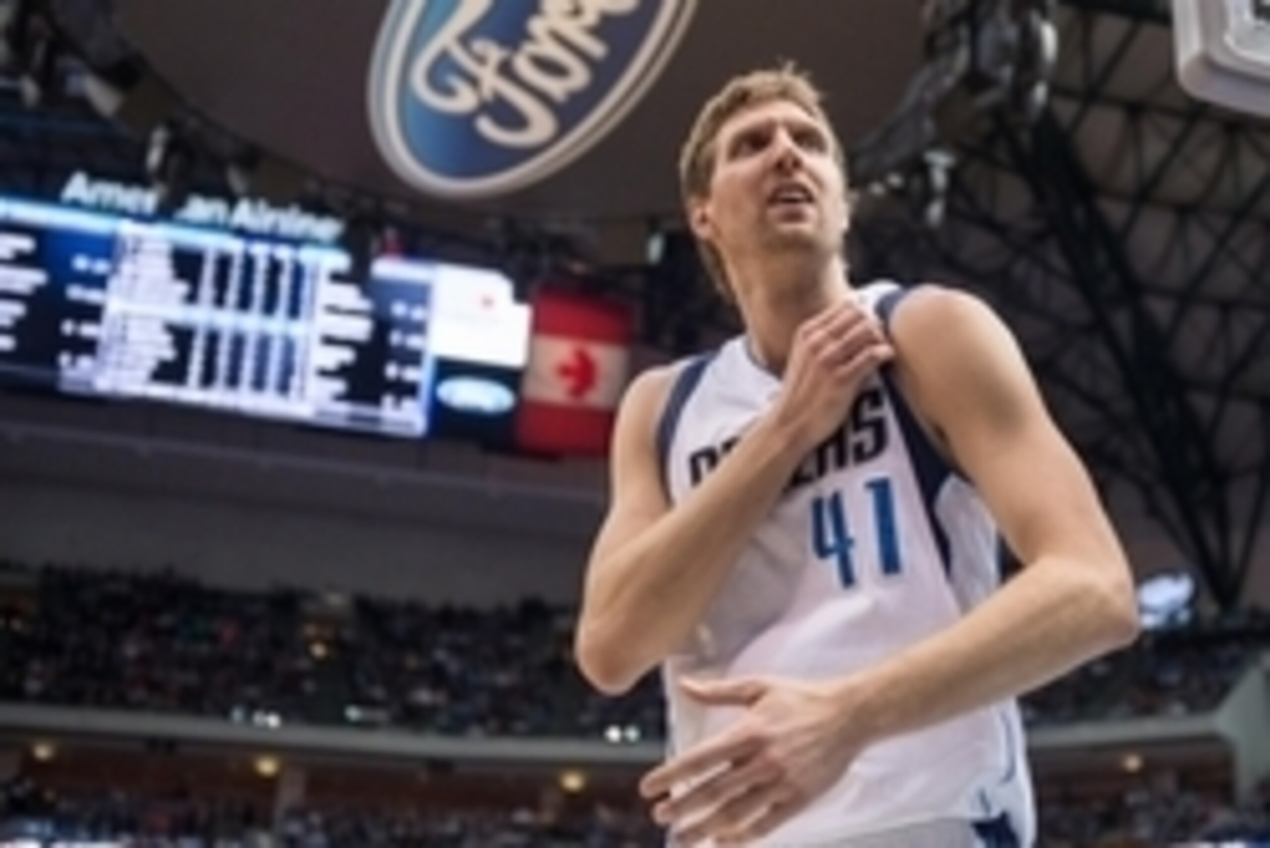 Dec 30, 2014; Dallas, TX, USA; Dallas Mavericks forward Dirk Nowitzki (41) checks the replay screen during the second half against the Washington Wizards at the American Airlines Center. The Mavericks defeated the Wizards 114-87. Mandatory Credit: Jerome 