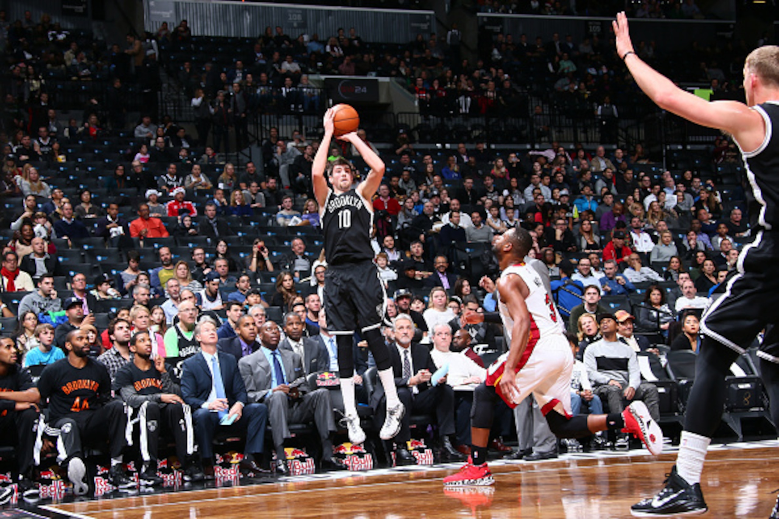 BROOKLYN, NY - DECEMBER 16: Sergey Karasev #10 of the Brooklyn Nets shoots the ball against the Miami Heat during the game on December 16, 2014 at Barclays Center in Brooklyn, New York. NOTE TO USER: User expressly acknowledges and agrees that, by downlo BROOKLYN, NY - DECEMBER 16: Sergey Karasev #10 of the Brooklyn Nets shoots the ball against the Miami Heat during the game on December 16, 2014 at Barclays Center in Brooklyn, New York. NOTE TO USER: User expressly acknowledges and agrees that, by downlo