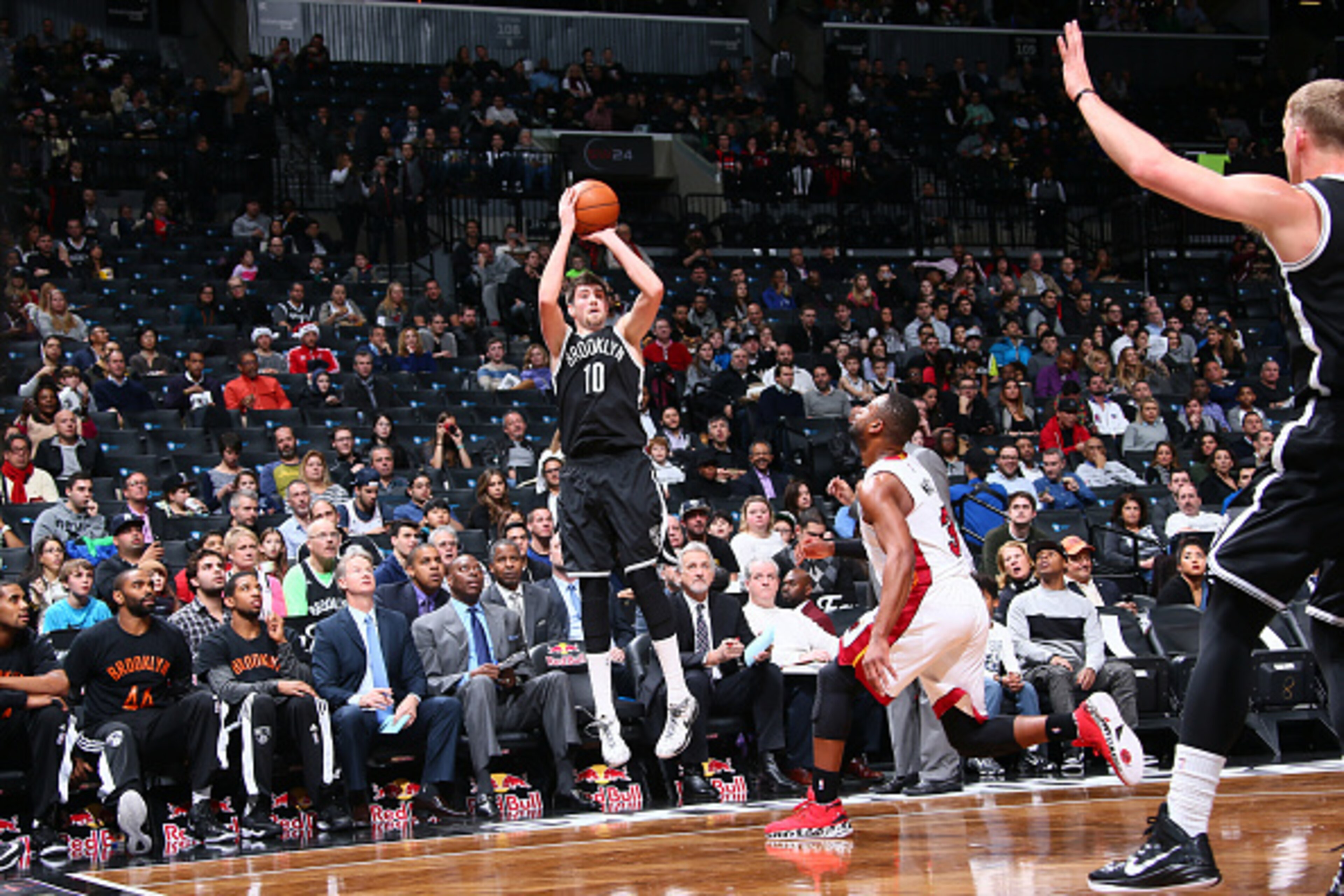 BROOKLYN, NY - DECEMBER 16:  Sergey Karasev #10 of the Brooklyn Nets shoots the ball against the Miami Heat during the game on December 16, 2014 at Barclays Center in Brooklyn, New York. NOTE TO USER: User expressly acknowledges and agrees that, by downlo