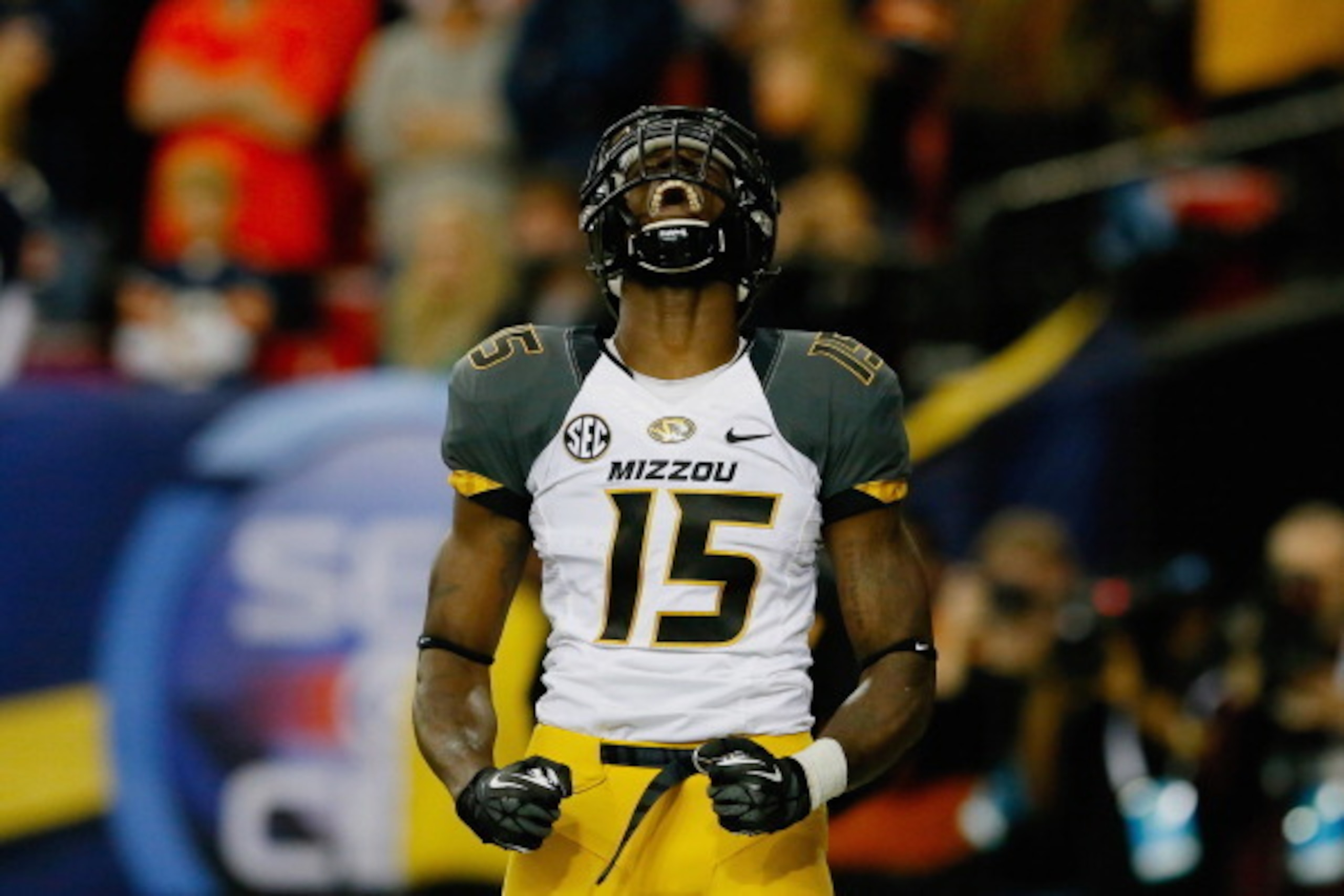 ATLANTA, GA - DECEMBER 07: Dorial Green-Beckham #15 of the Missouri Tigers reacts after scoring a touchdown in the first quarter against the Auburn Tigers during the SEC Championship Game at Georgia Dome on December 7, 2013 in Atlanta, Georgia.  (Photo by