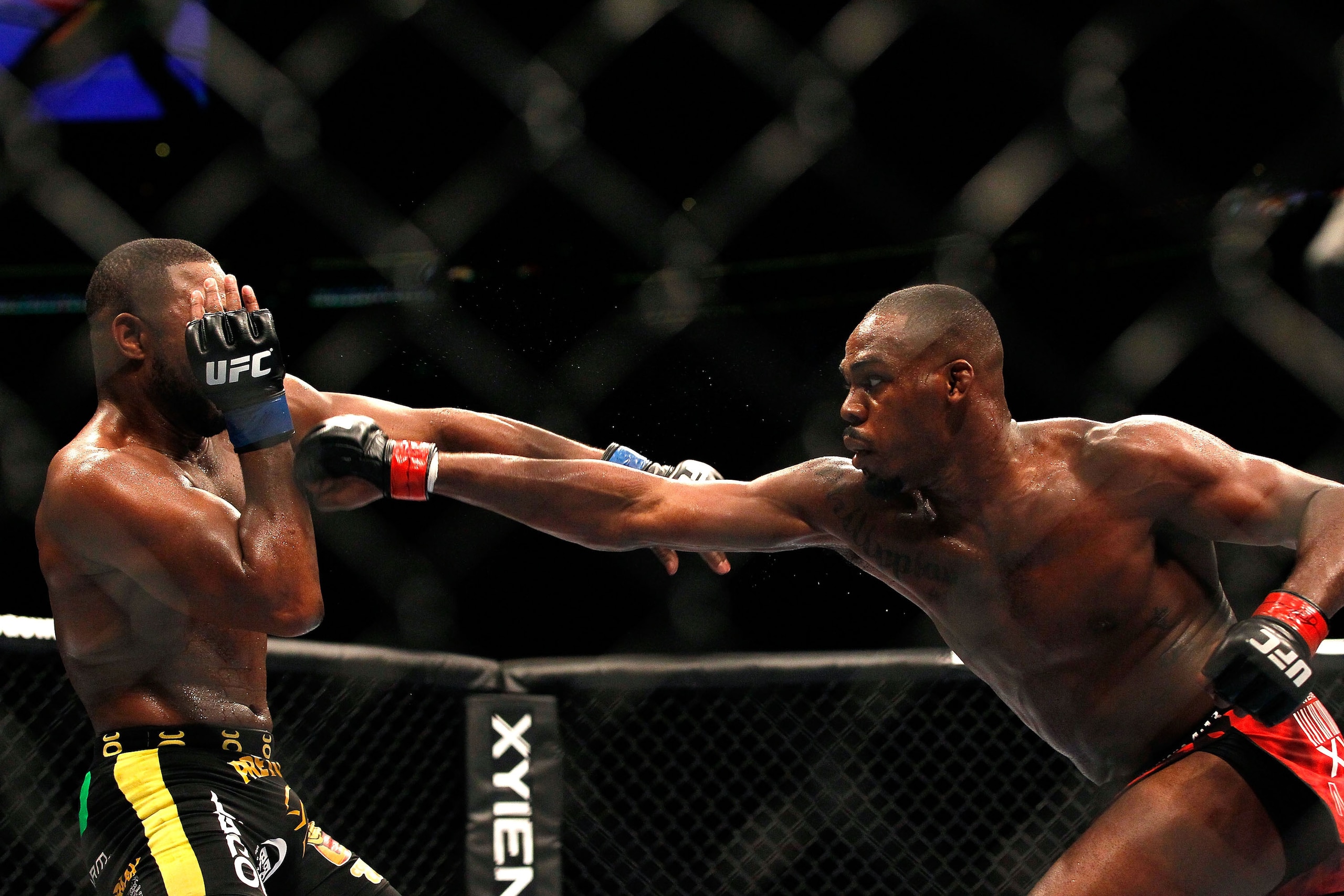 ATLANTA, GA - APRIL 21:  Jon Jones (R) punches Rashad Evans during their light heavyweight title bout for UFC 145 at Philips Arena on April 21, 2012 in Atlanta, Georgia.  (Photo by Kevin C. Cox/Getty Images)