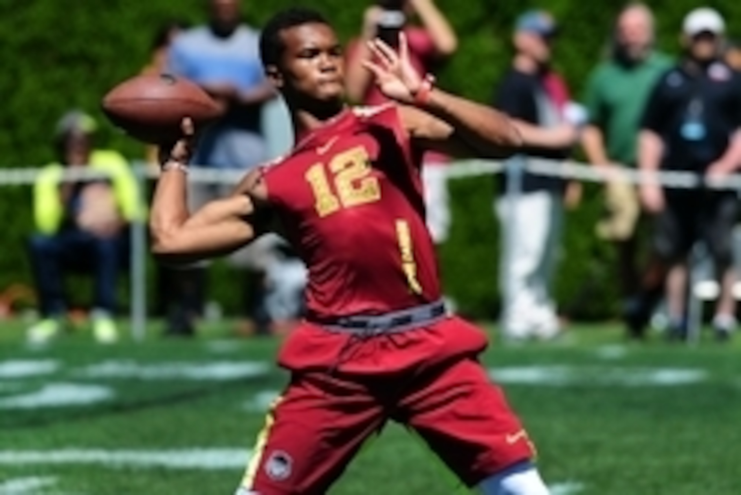 Jul 9, 2014; Beaverton, OR, USA; Vapor Carbon quarterback Kyler Murray (12) passes the ball during Nike Football ' The Opening' at Nike World Headquarters. Mandatory Credit: Steve Dykes-USA TODAY Sports