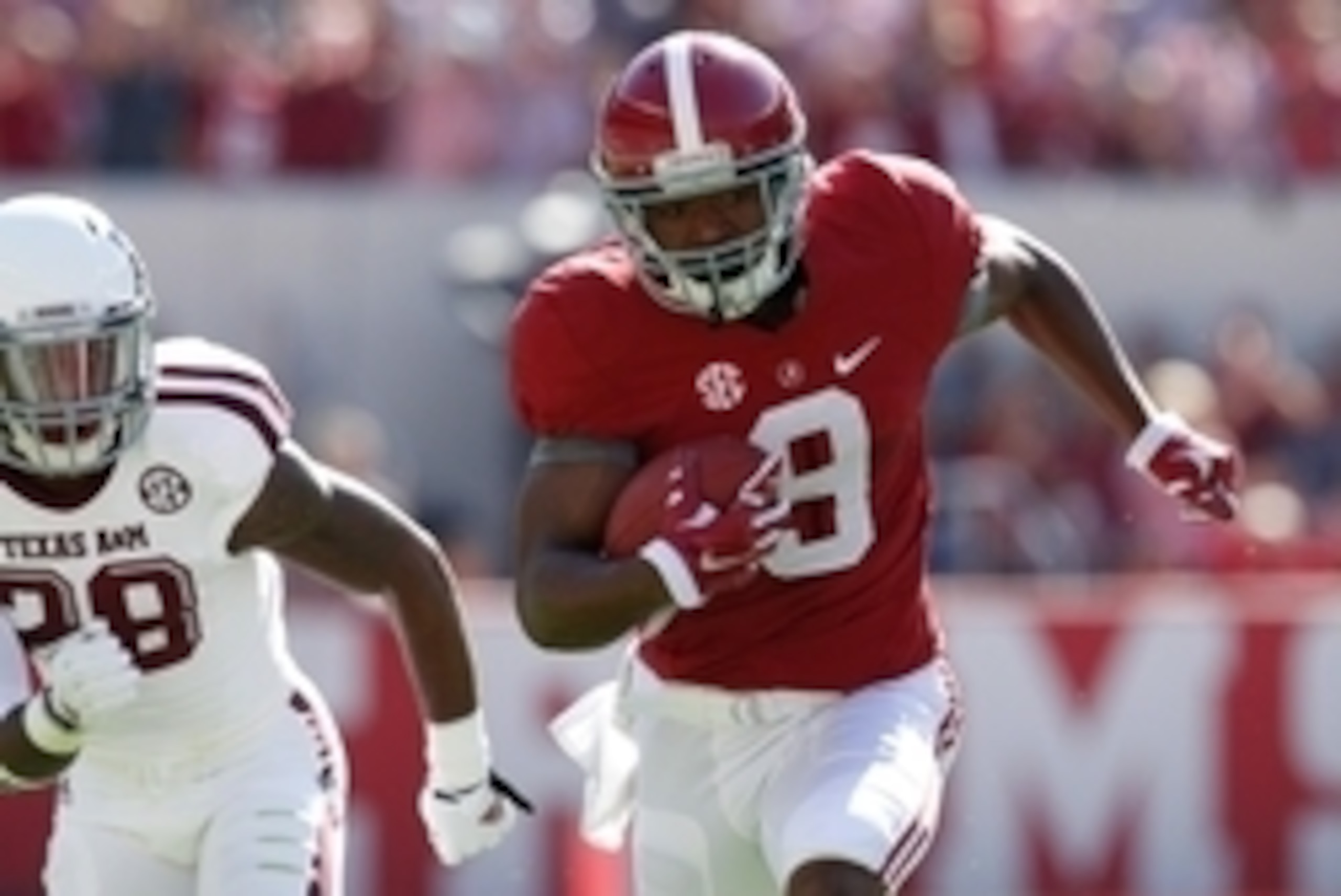 Oct 18, 2014; Tuscaloosa, AL, USA; Alabama Crimson Tide wide receiver Amari Cooper (9) carries the ball against the Texas A&M Aggies at Bryant-Denny Stadium. Mandatory Credit: Marvin Gentry-USA TODAY Sports
