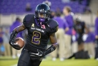 Oct 23, 2014; Greenville, NC, USA; East Carolina Pirates wide receiver Justin Hardy (2) runs with ball before the game against the Connecticut Huskies at Dowdy-Ficklen Stadium. The East Carolina Pirates defeated the Connecticut Huskies 31-21. Mandatory Cr