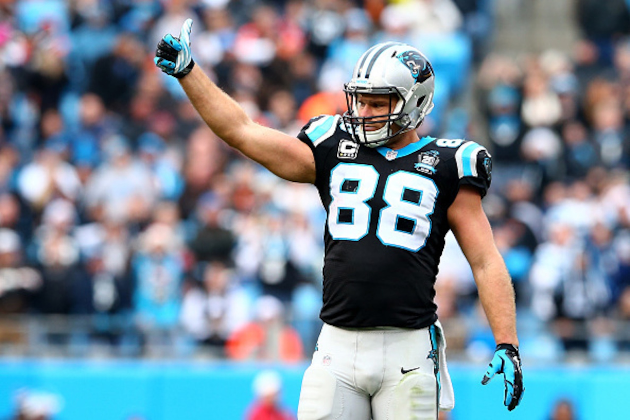 CHARLOTTE, NC - DECEMBER 21:   Greg Olsen #88 of the Carolina Panthers reacts after a play during their game against the Cleveland Browns at Bank of America Stadium on December 21, 2014 in Charlotte, North Carolina.  (Photo by Streeter Lecka/Getty Images)