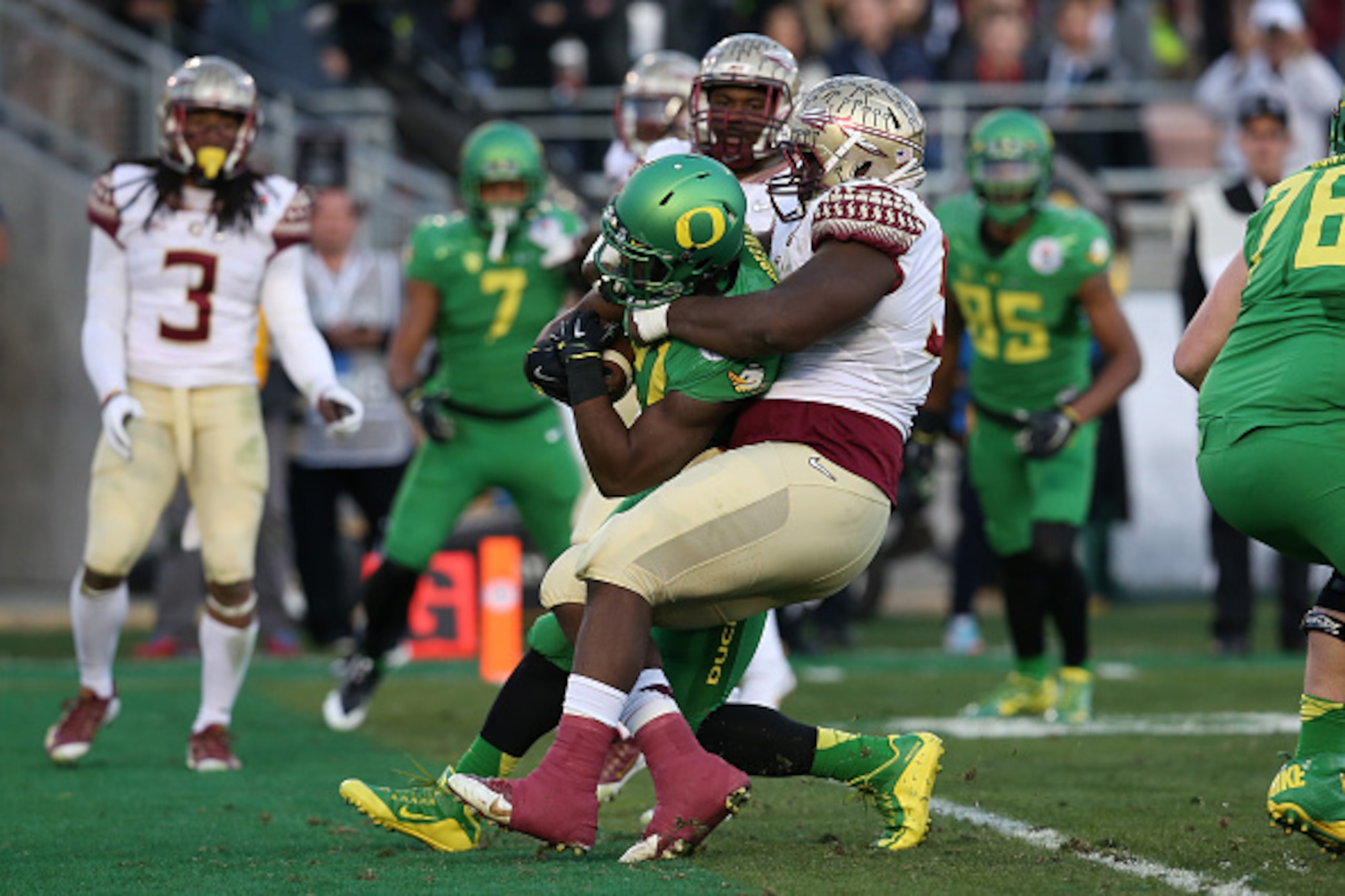 PASADENA, CA - JANUARY 01:  Running back Royce Freeman #21 of the Oregon Ducks scores a touchdown on a three-yard run in the third quarter of the College Football Playoff Semifinal against the Florida State Seminoles at the Rose Bowl Game presented by Nor