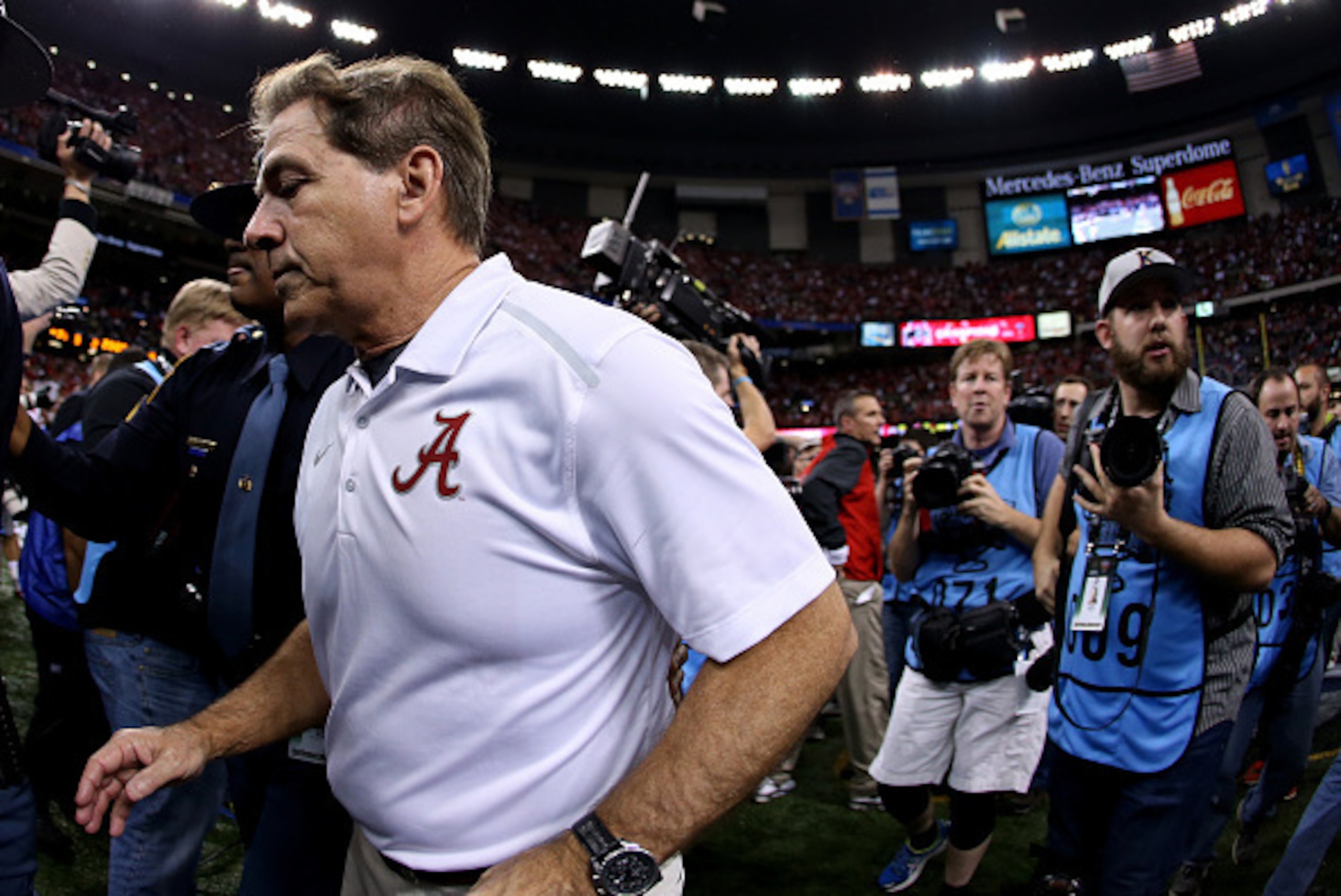 NEW ORLEANS, LA - JANUARY 01:  Head coach Nick Saban of the Alabama Crimson Tide walks off the field after being defeated by the Ohio State Buckeyes in the All State Sugar Bowl at the Mercedes-Benz Superdome on January 1, 2015 in New Orleans, Louisiana.  