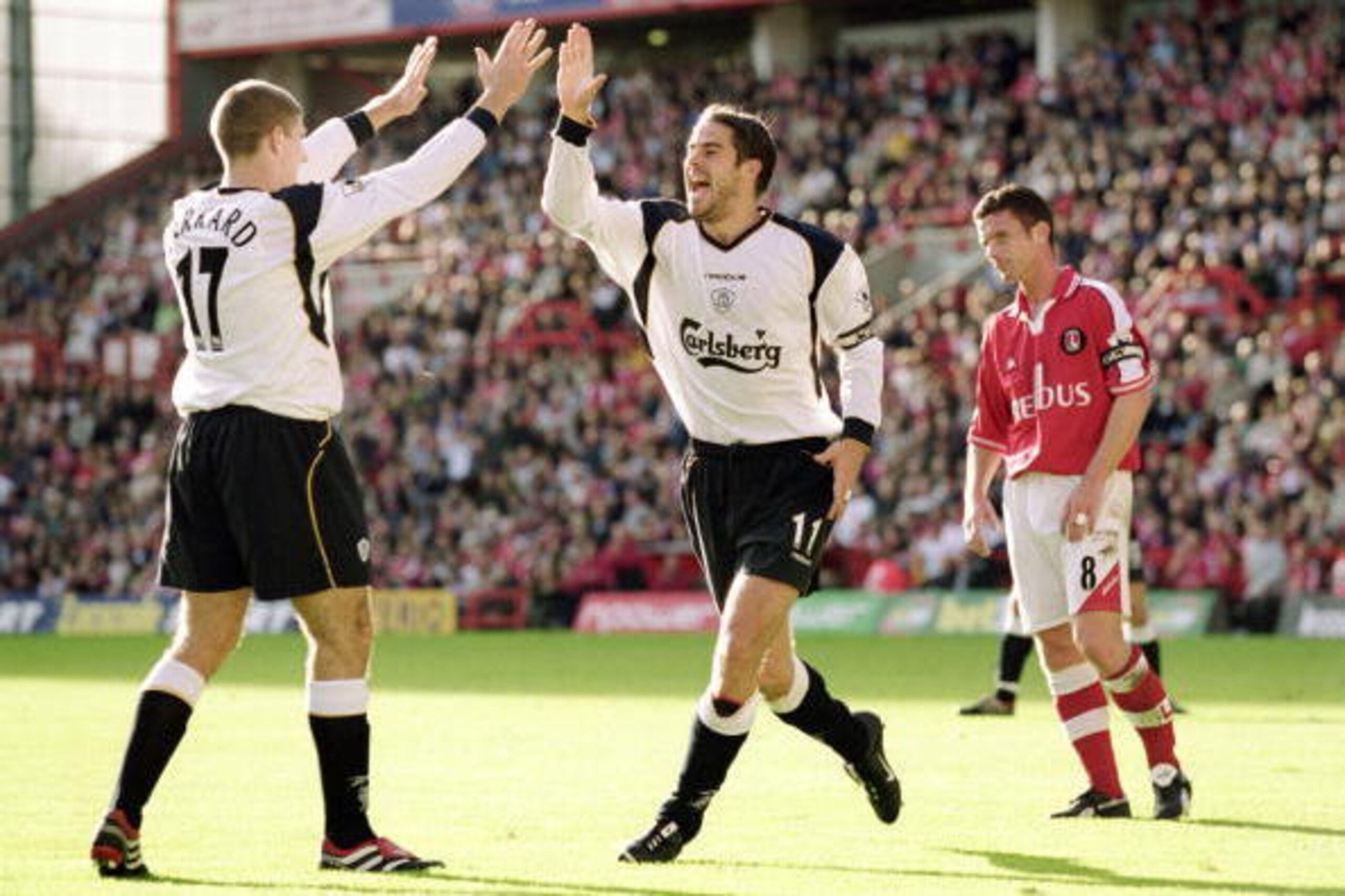 27 Oct 2001:  Jamie Redknapp of Liverpool celebrates his goal with team mate Steven Gerrard during the FA Barclaycard Premiership match between Charlton Athletic and Liverpool at the Valley in London. Liverpool won 2-0. \ Mandatory Credit: Ben Radford /Al