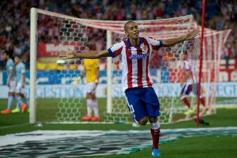 MADRID, SPAIN - AUGUST 30:  Joao Miranda of Atletico de Madrid celebrates scoring their opening goal during the La Liga match between Club Atletico de Madrid and SD Eibar at Vicente Calderon Stadium on August 30, 2014 in Madrid, Spain.  (Photo by Gonzalo 