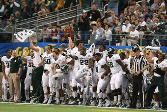 ARLINGTON, TX - JANUARY 01:  The Michigan State Spartans celebrate after a blocked field goal during a game against the Baylor Bears during the Goodyear Cotton Bowl Classic at AT&T Stadium on January 1, 2015 in Arlington, Texas.  (Photo by Sarah Glenn/Get