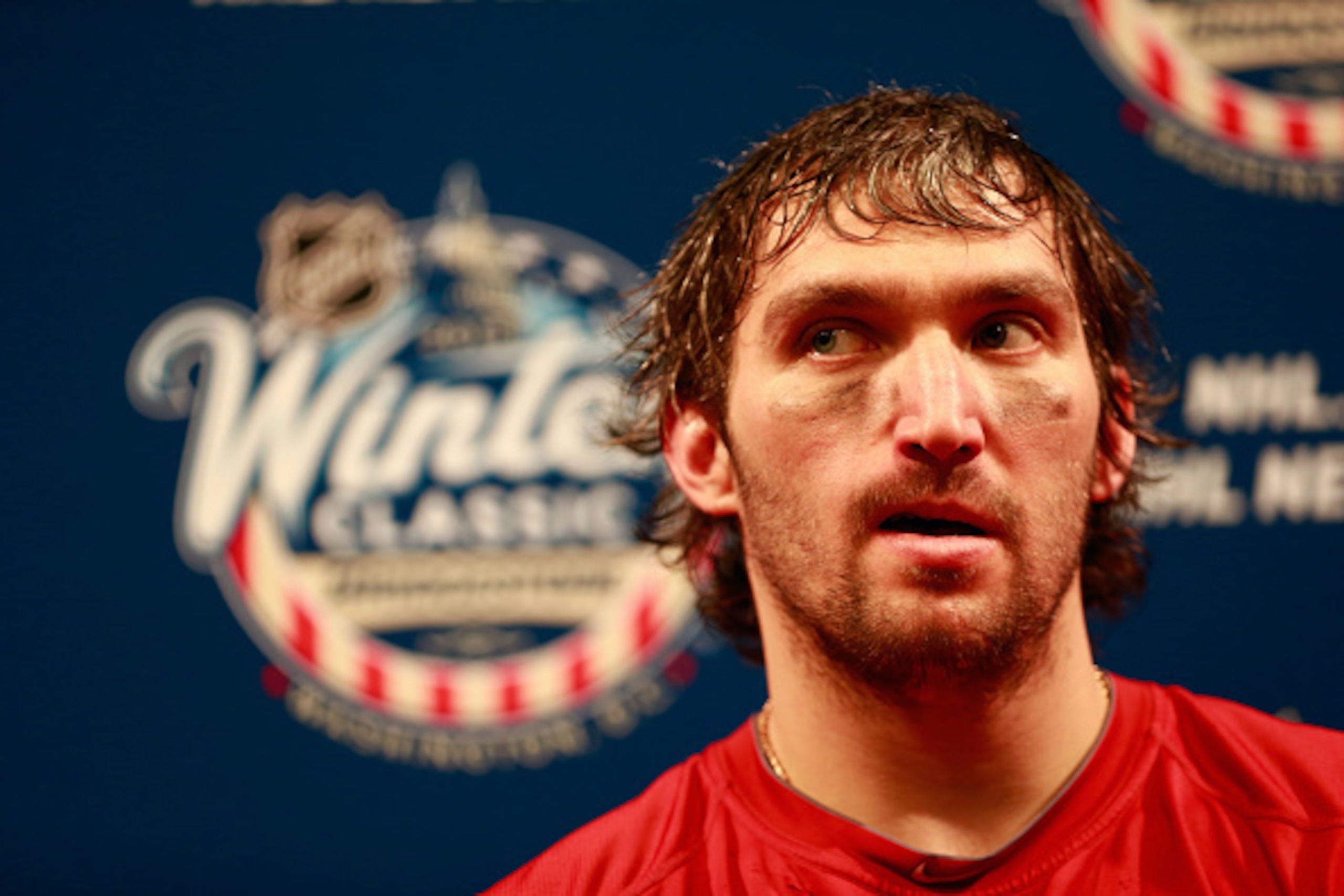 WASHINGTON, DC - JANUARY 01:  Alex Ovechkin #8 of the Washington Capitals speaks to the media during the press conference after the 2015 Bridgestone NHL Winter Classic against the Chicago Blackhawks on January 1, 2015 at Nationals Park in Washington, DC. 