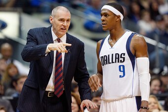 DALLAS, TX - DECEMBER 26:  Head coach Rick Carlisle of the Dallas Mavericks talks with Rajon Rondo #9 of the Dallas Mavericks as the Mavericks take on the Los Angeles Lakers at American Airlines Center on December 26, 2014 in Dallas, Texas. NOTE TO USER: 