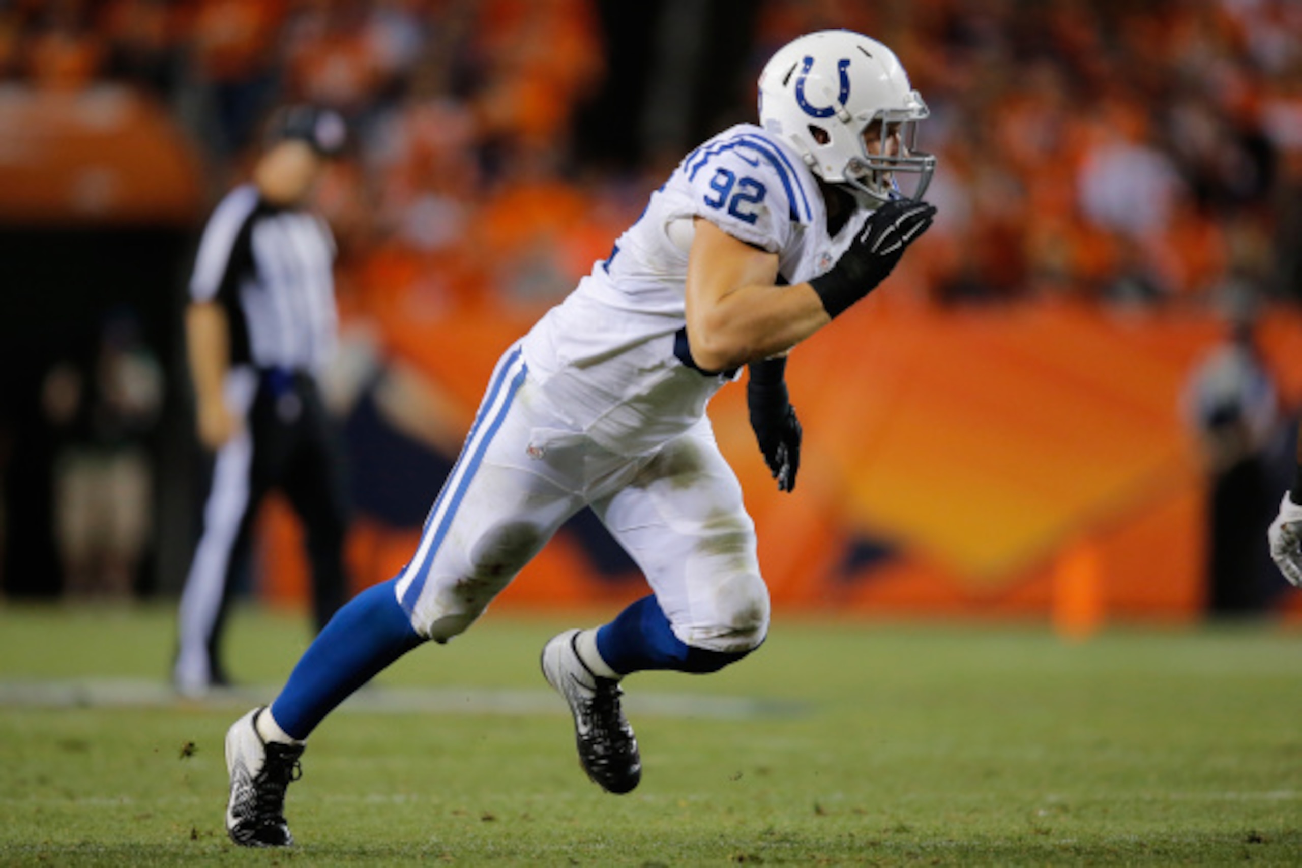 DENVER, CO - SEPTEMBER 07:  Outside linebacker Bjoern Werner #92 of the Indianapolis Colts rushes the line of scrimmage against the Denver Broncos at Sports Authority Field at Mile High on September 7, 2014 in Denver, Colorado. The Broncos defeated the Co
