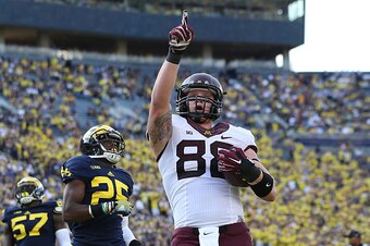 ANN ARBOR, MI - SEPTEMBER 27: Maxx Williams #88 of the Minnesota Golden Gophers celebrates after scoring a one yard touchdown during the third quarter of the game against the Michigan Wolverines at Michigan Stadium on September 27, 2014 in Ann Arbor, Mich