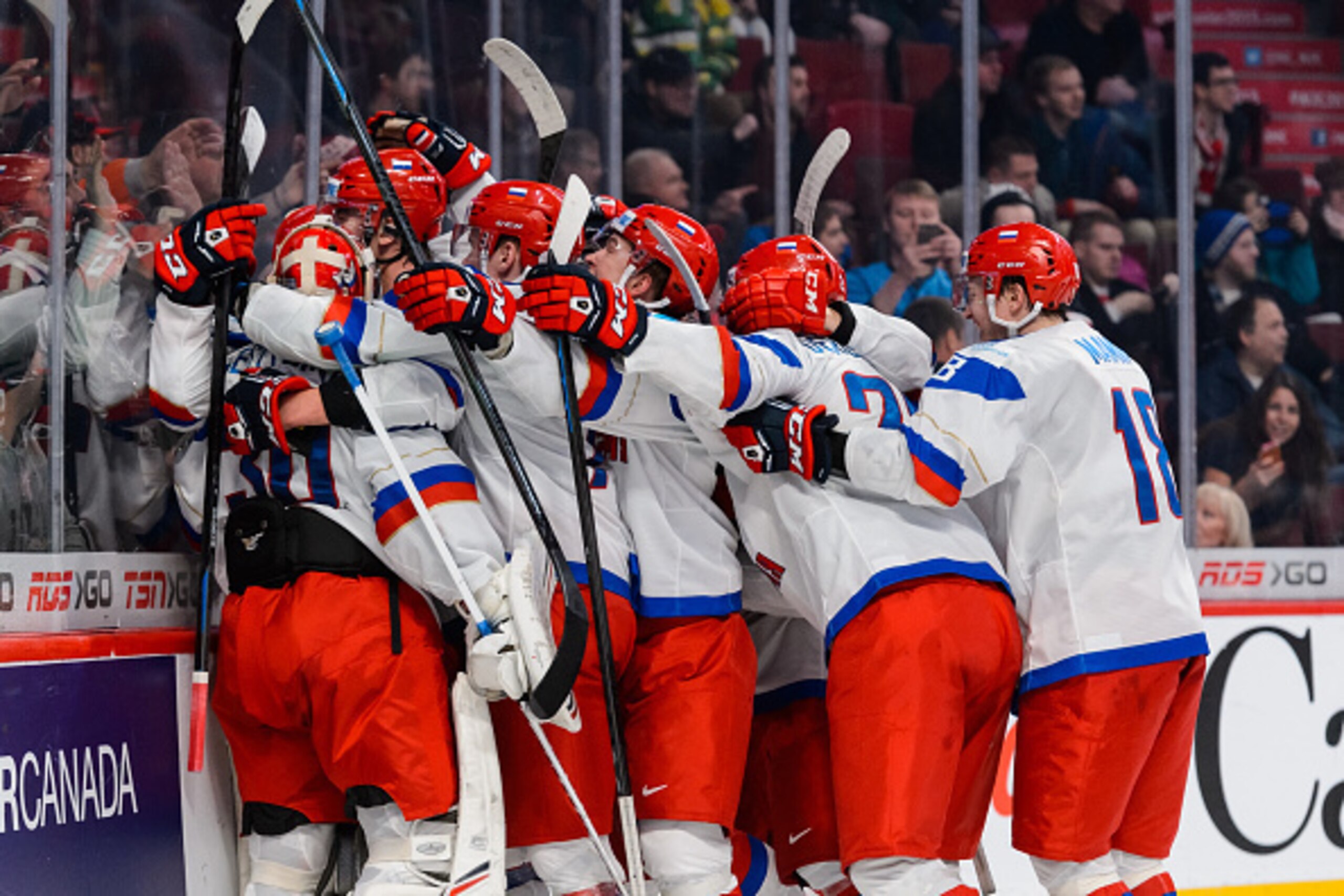 MONTREAL, QC - JANUARY 02:  Team Russia celebrates a victory over Team United States in a quarterfinal round during the 2015 IIHF World Junior Hockey Championships at the Bell Centre on January 2, 2015 in Montreal, Quebec, Canada.  Team Russia defeated Te