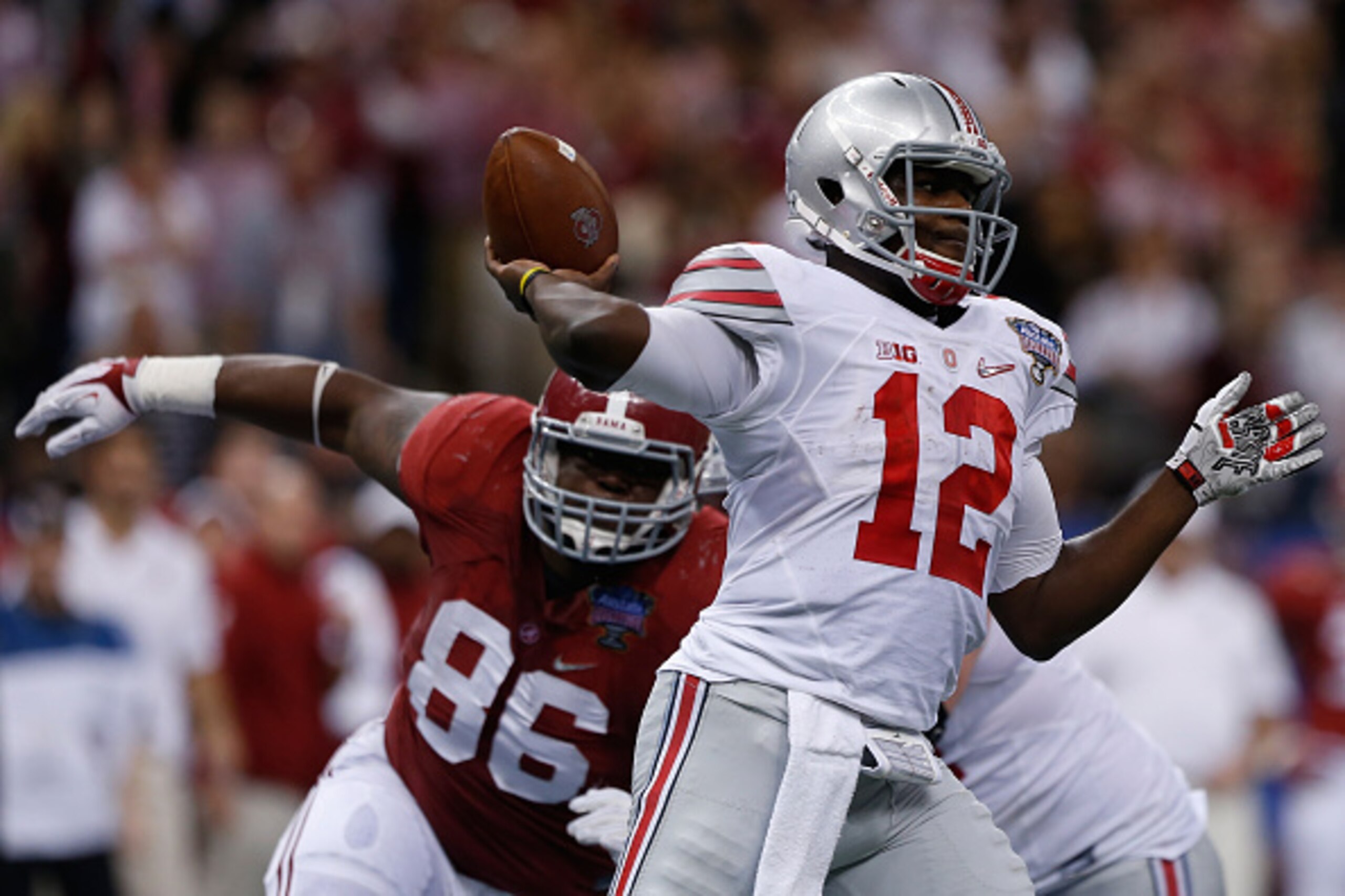 NEW ORLEANS, LA - JANUARY 01: Cardale Jones #12 of the Ohio State Buckeyes in action against the Alabama Crimson Tide during the All State Sugar Bowl at the Mercedes-Benz Superdome on January 1, 2015 in New Orleans, Louisiana. (Photo by Sean Gardner/Get NEW ORLEANS, LA - JANUARY 01: Cardale Jones #12 of the Ohio State Buckeyes in action against the Alabama Crimson Tide during the All State Sugar Bowl at the Mercedes-Benz Superdome on January 1, 2015 in New Orleans, Louisiana. (Photo by Sean Gardner/Get
