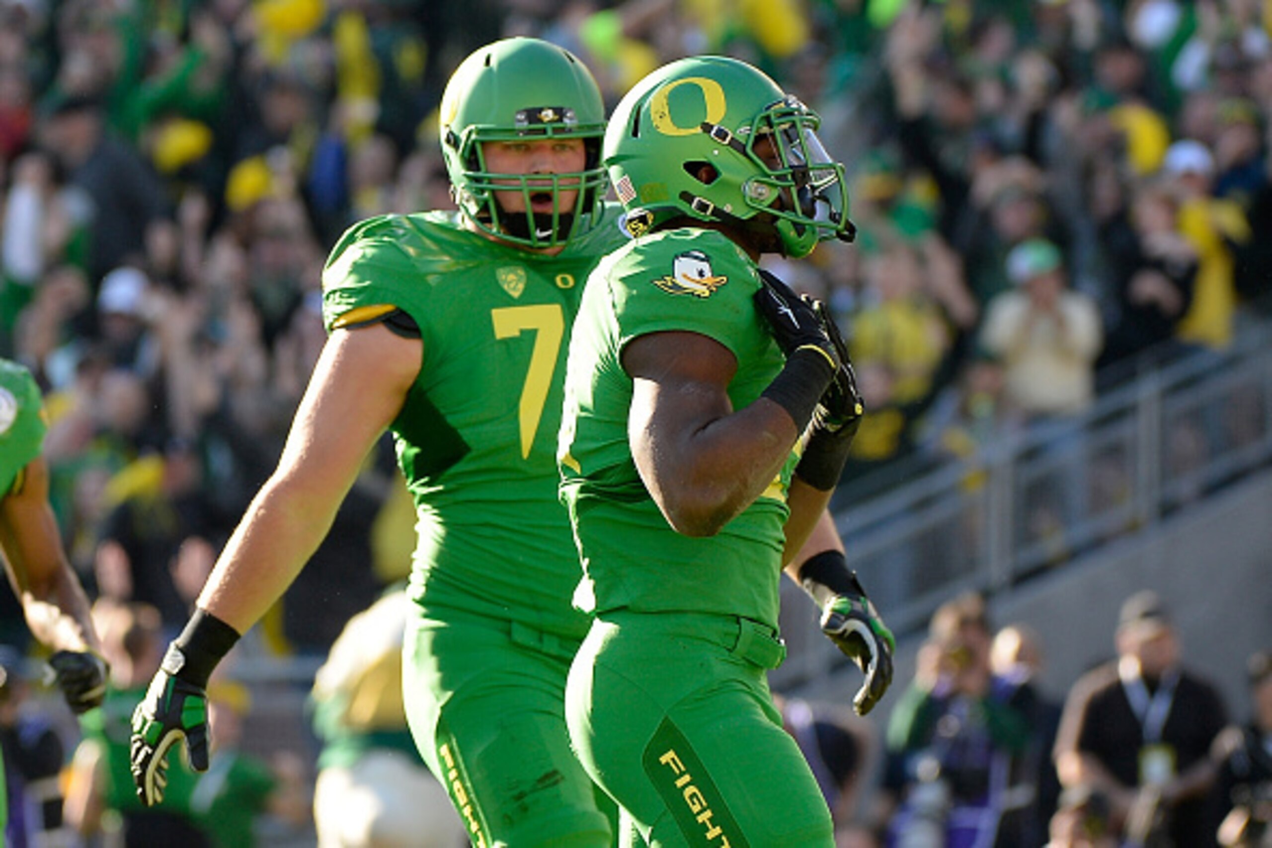PASADENA, CA - JANUARY 01: Running back Royce Freeman #21 of the Oregon Ducks celebrates after a one-yard touchdown against the Florida State Seminoles in the first quarter of the College Football Playoff Semifinal at the Rose Bowl Game presented by Nort PASADENA, CA - JANUARY 01: Running back Royce Freeman #21 of the Oregon Ducks celebrates after a one-yard touchdown against the Florida State Seminoles in the first quarter of the College Football Playoff Semifinal at the Rose Bowl Game presented by Nort